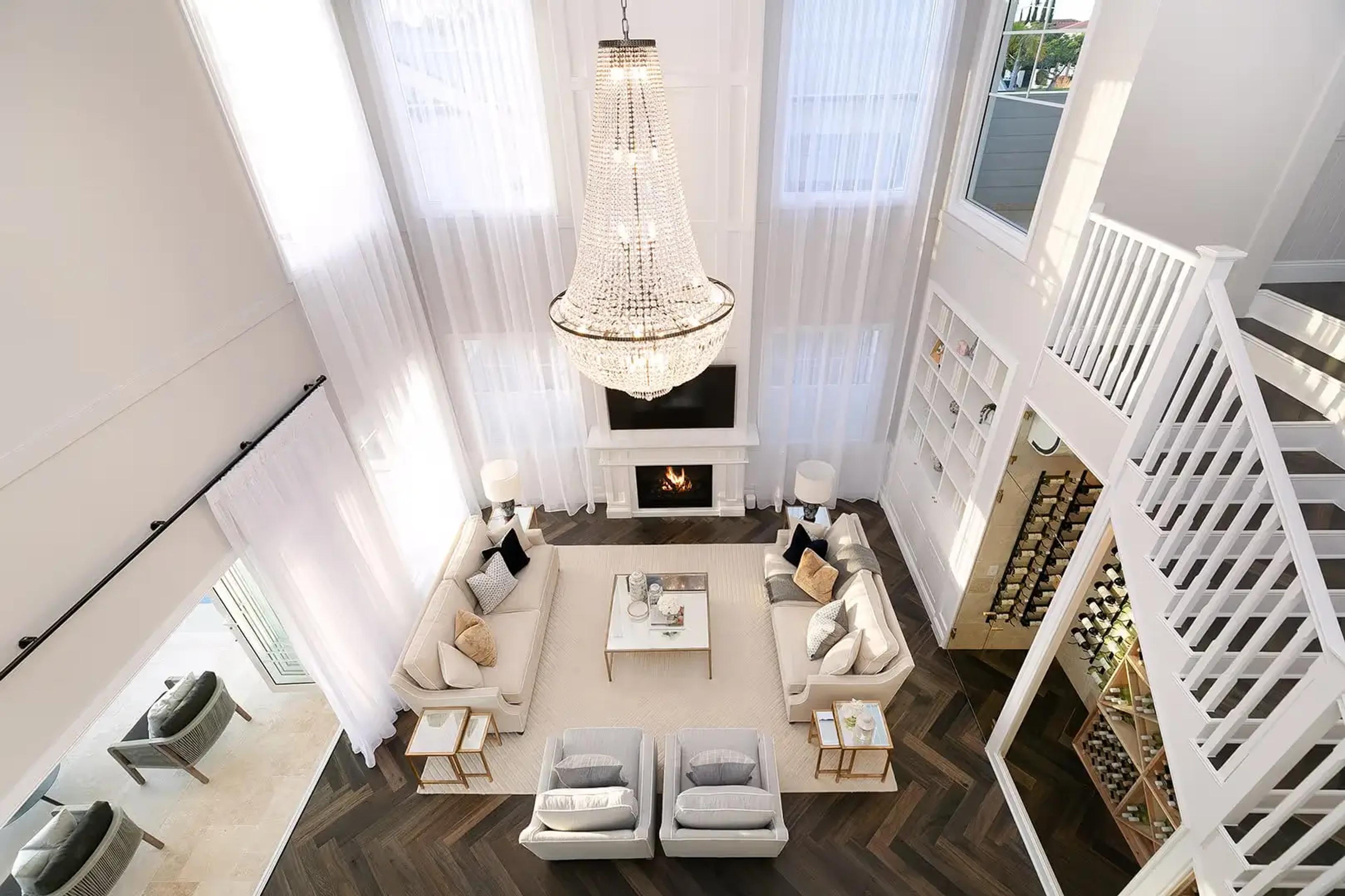 Double-height void and living room design in an Ascot home renovation.