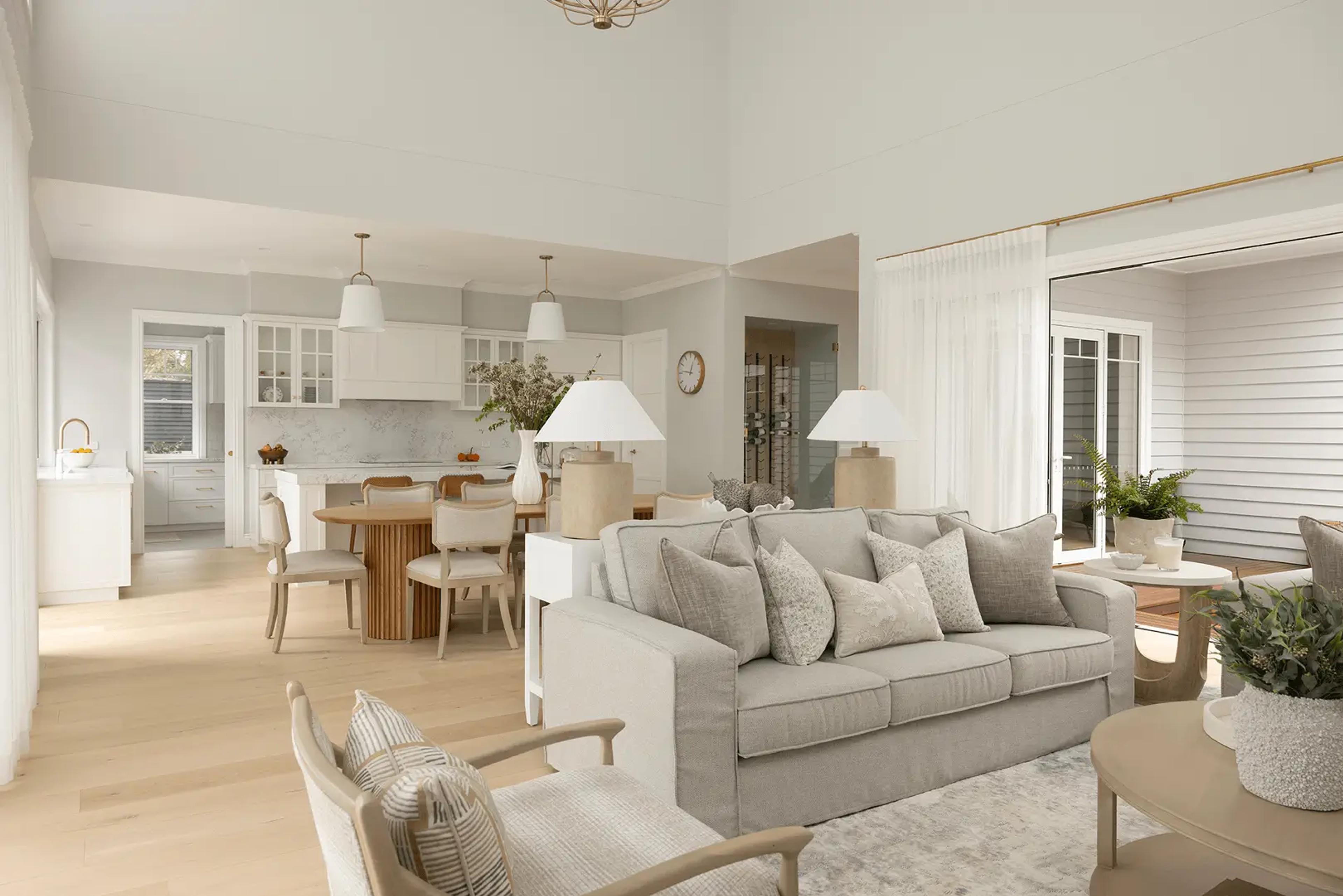 Open-plan living room adjoining kitchen and dining