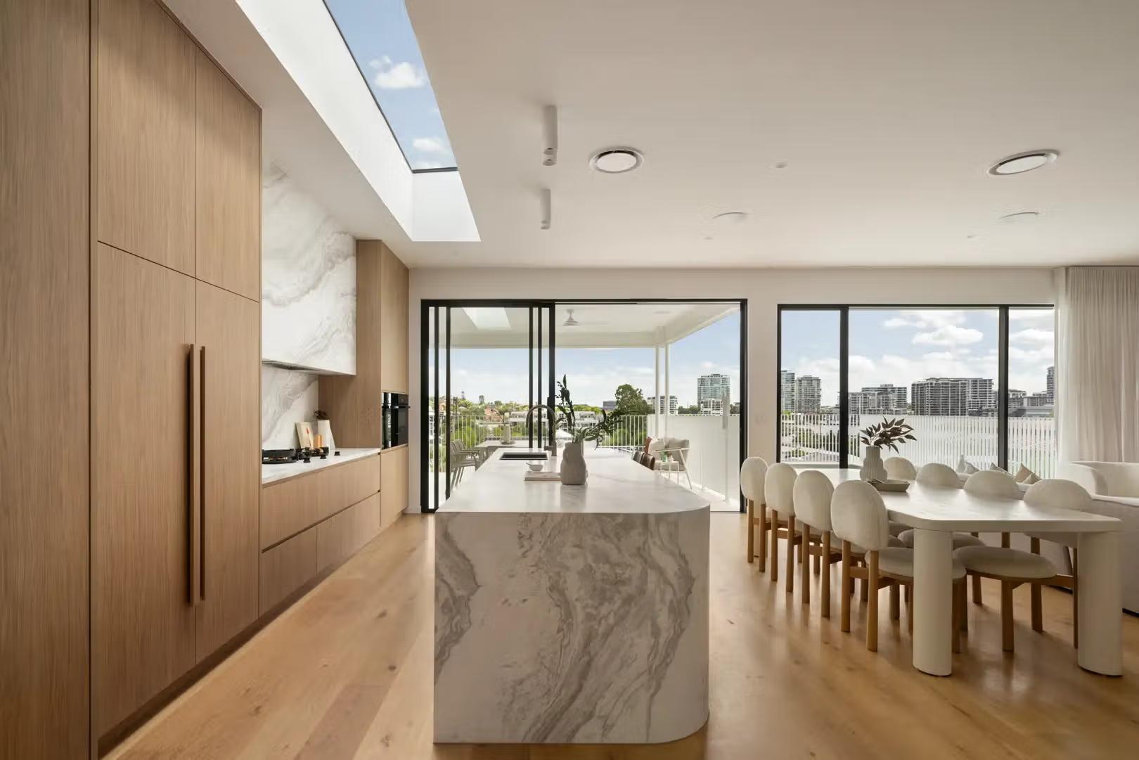 Open-plan living zone with sightlines through to the outdoor space, Prelude in Bulimba, by Invilla Architecture.