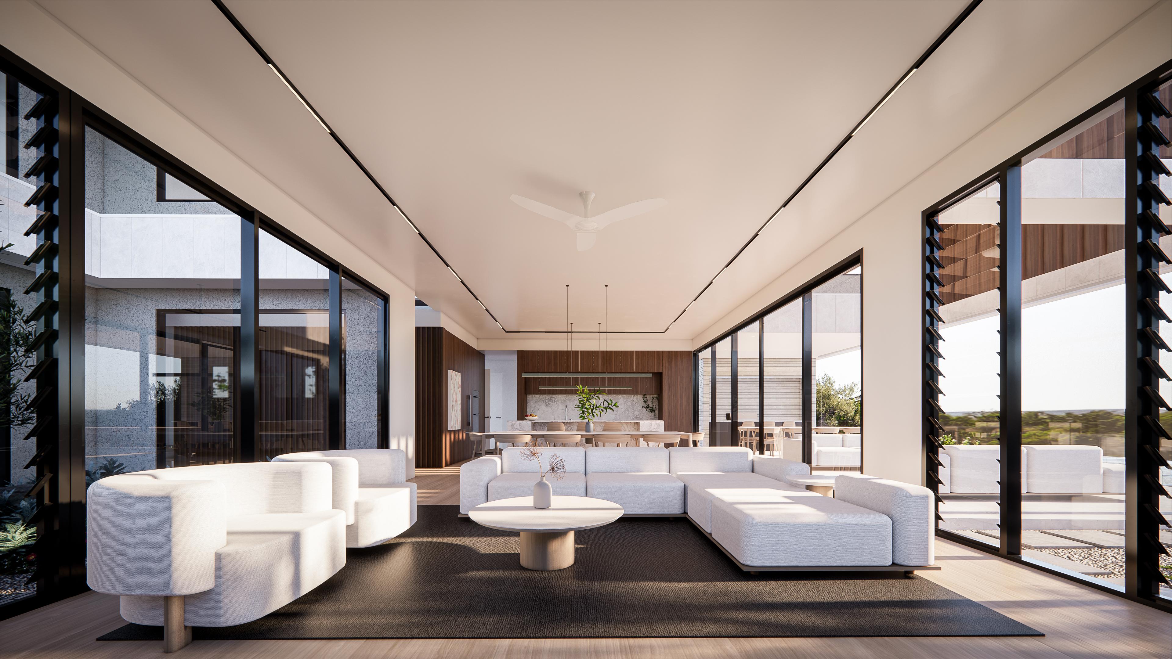 Open living room with white modular sofa, black-framed glazing and the kitchen and dining beyond