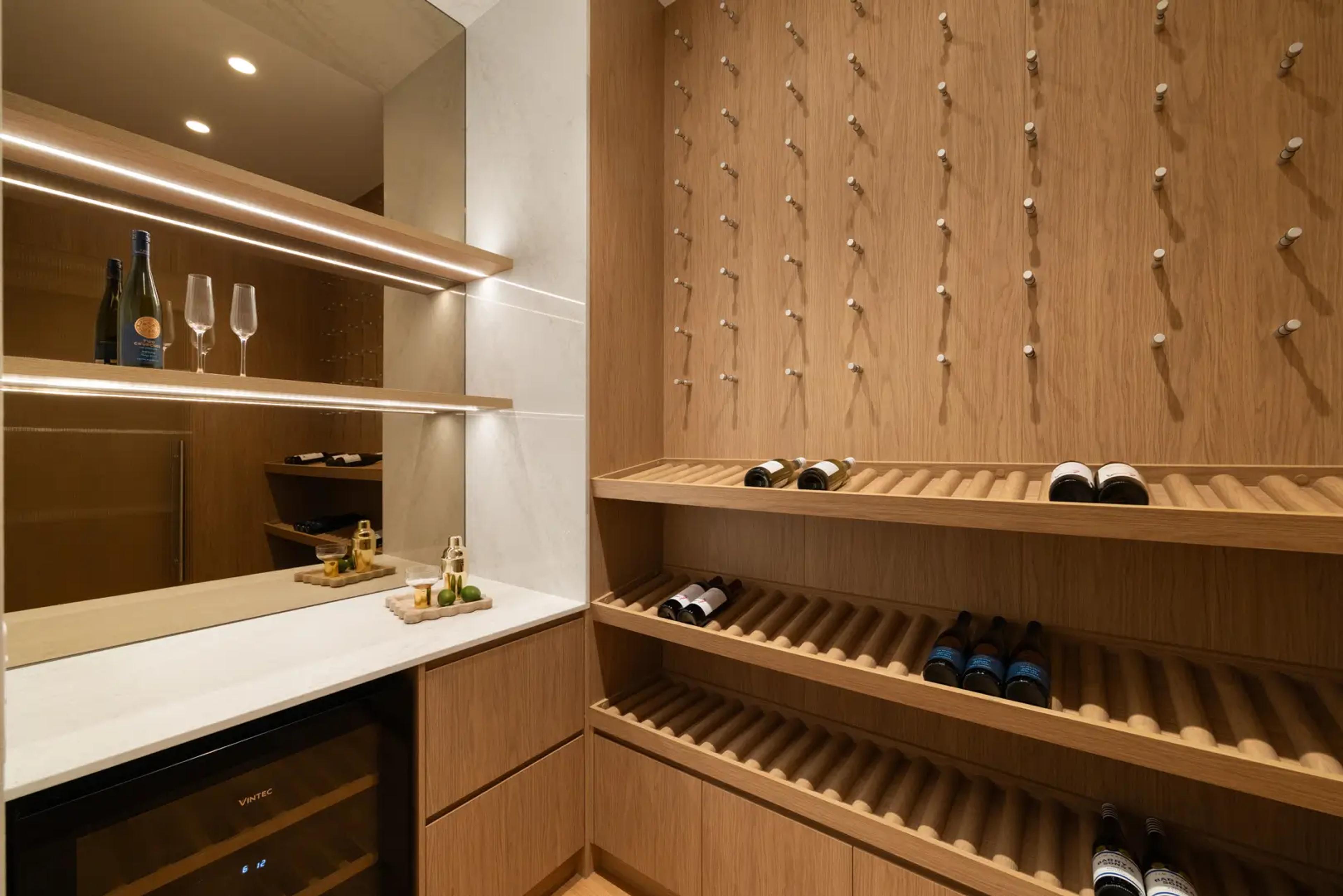 Wine cellar with timber bottle racks and bar