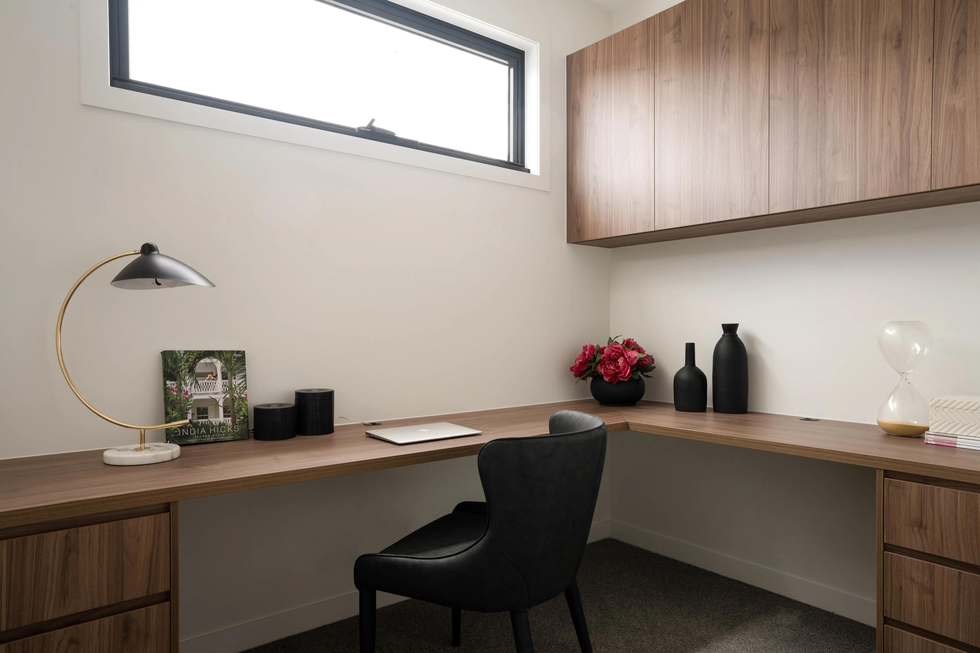 Home office with timber desk and cabinetry