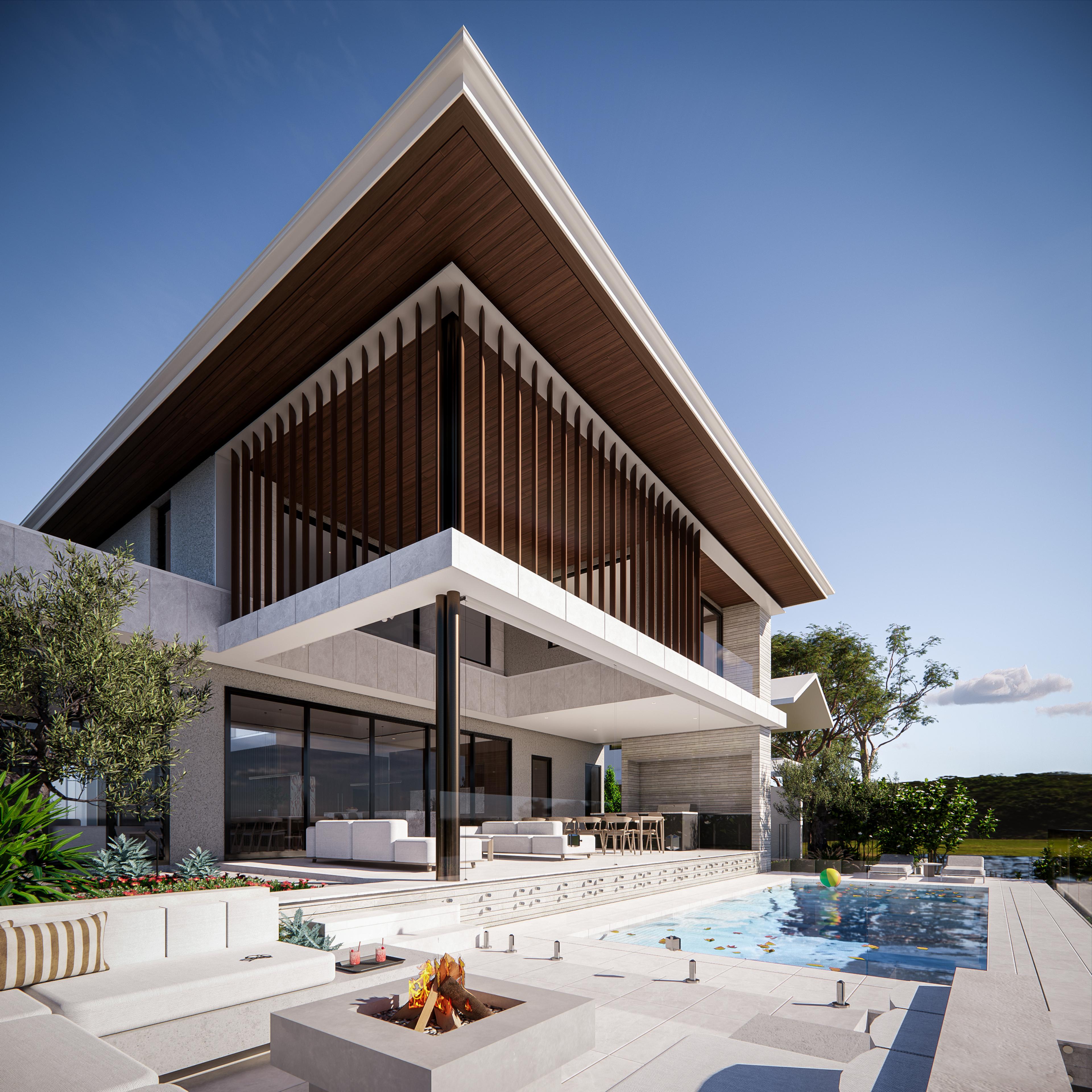 Poolside firepit and built-in lounge on the paved terrace with the house facade and pool behind