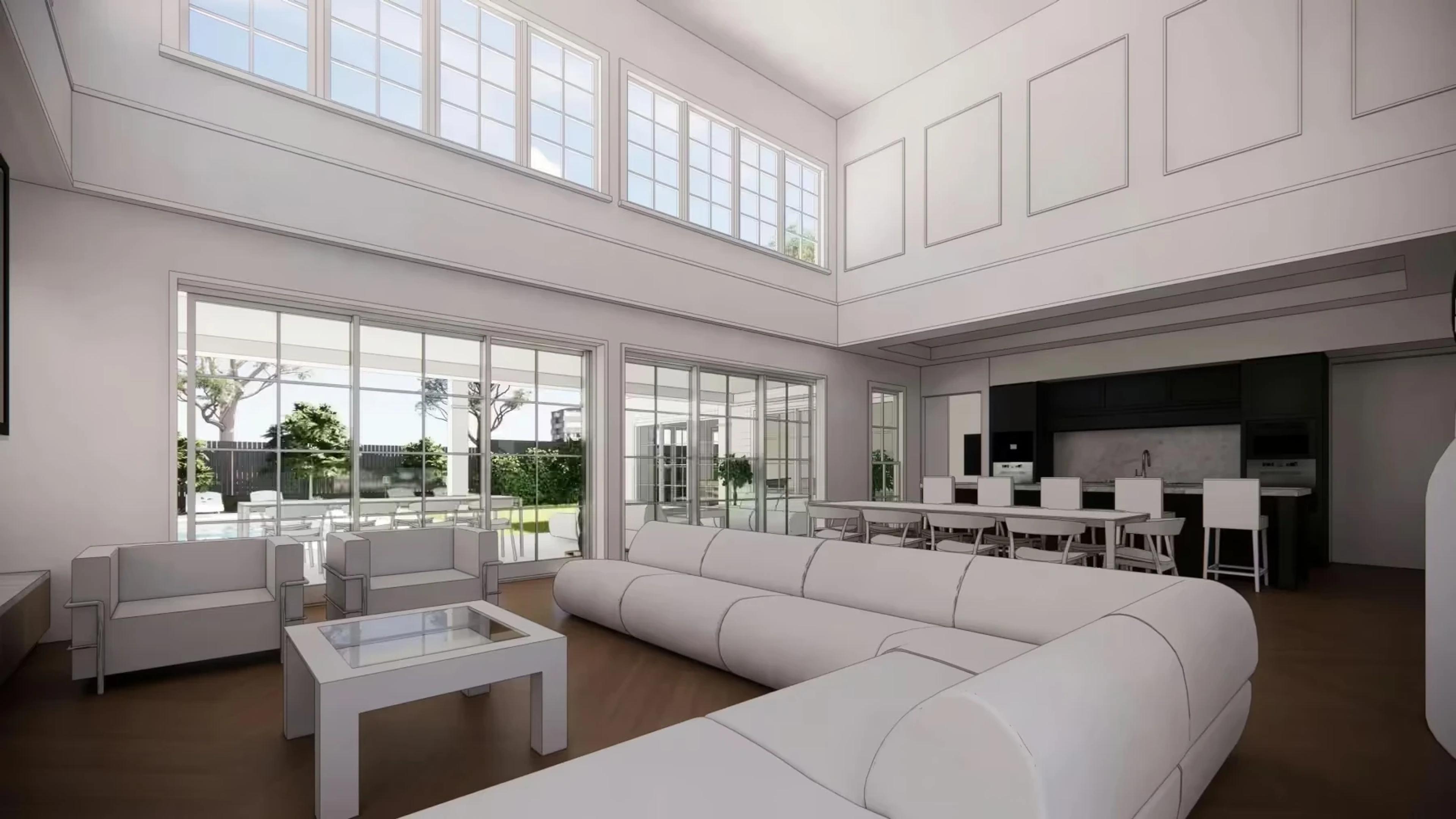 Double height living room with white sofas and kitchen beyond