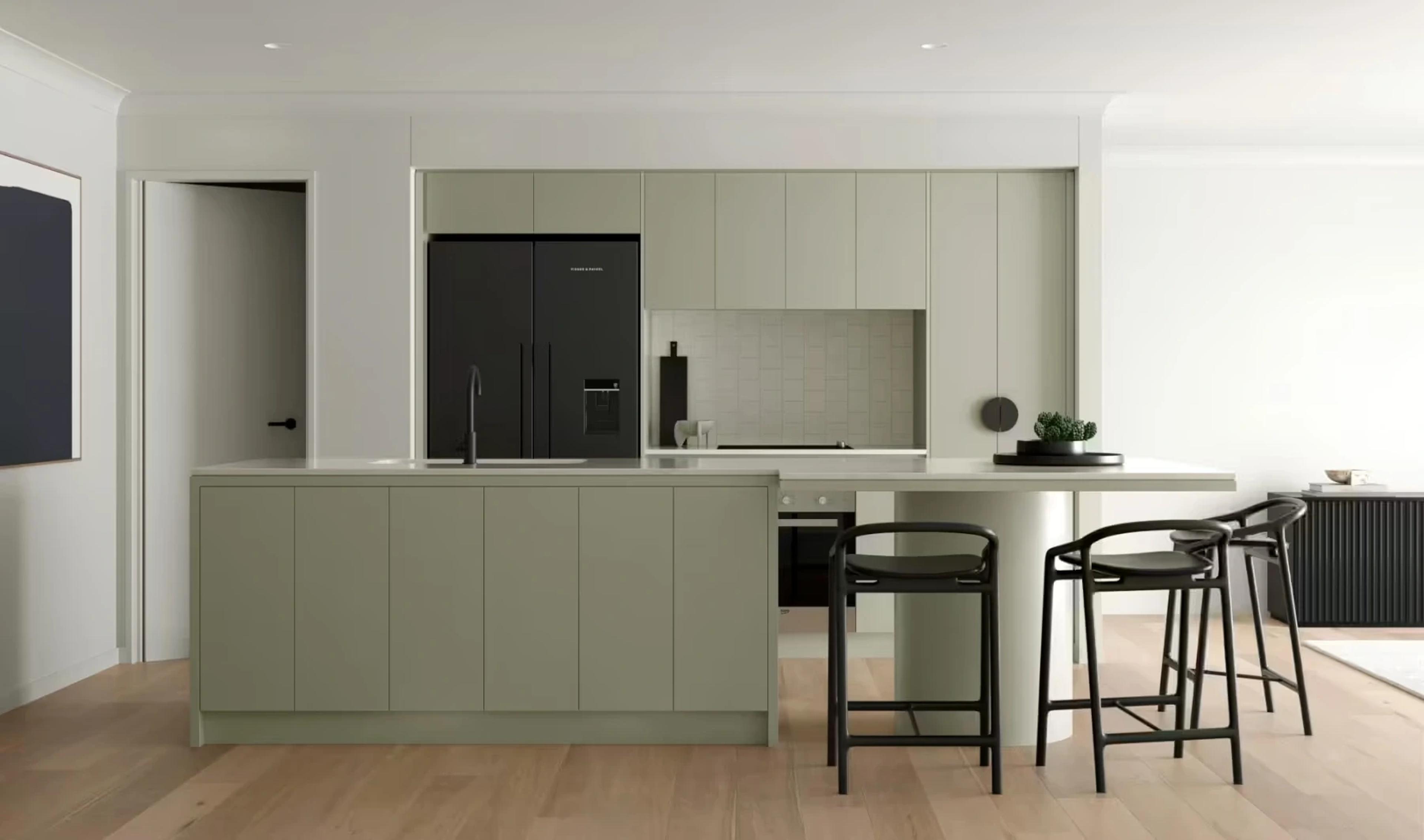 Kitchen with sage green cabinets and island bench seating