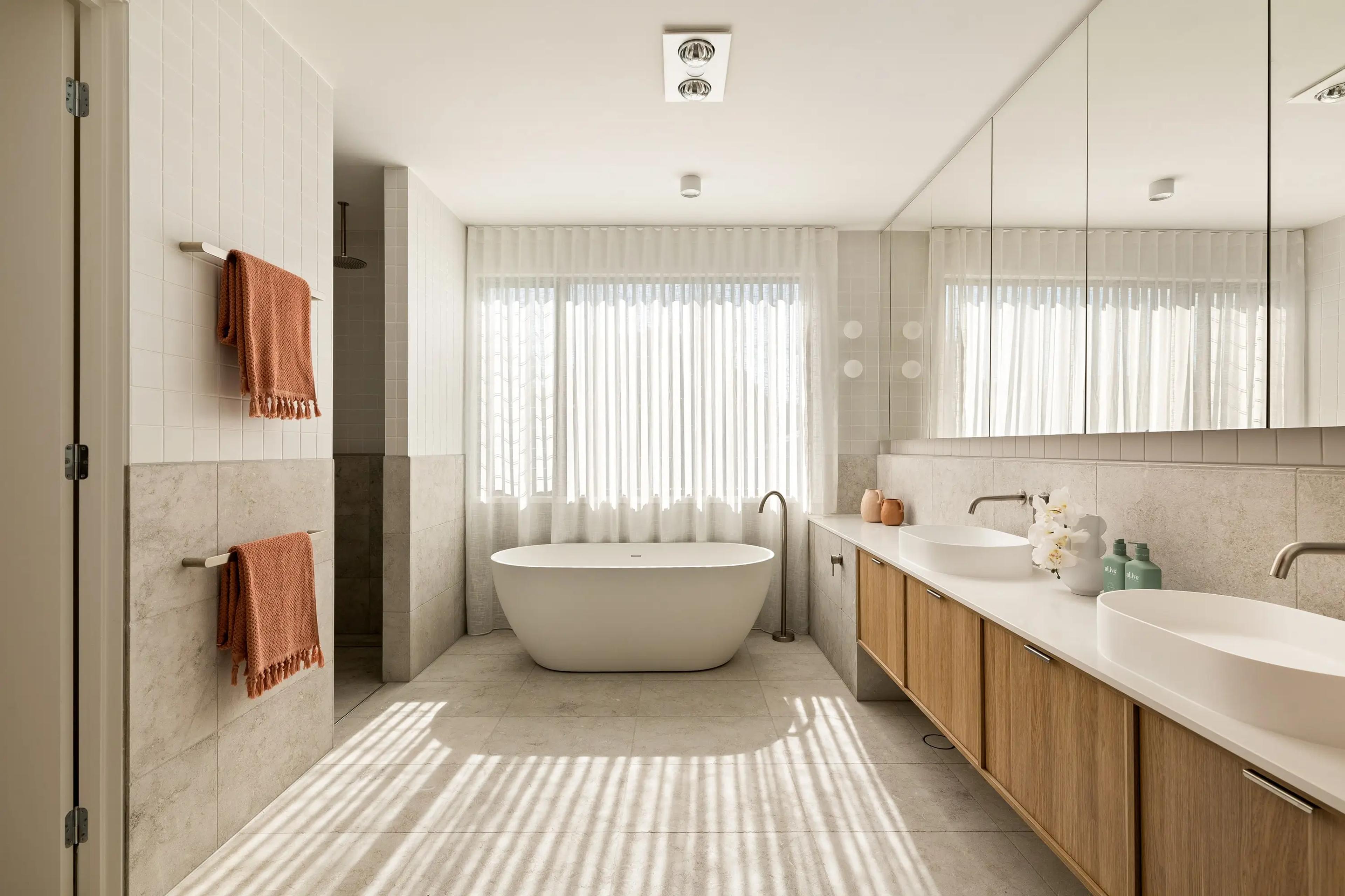 Ensuite bathroom with freestanding bath, shower and double vanity