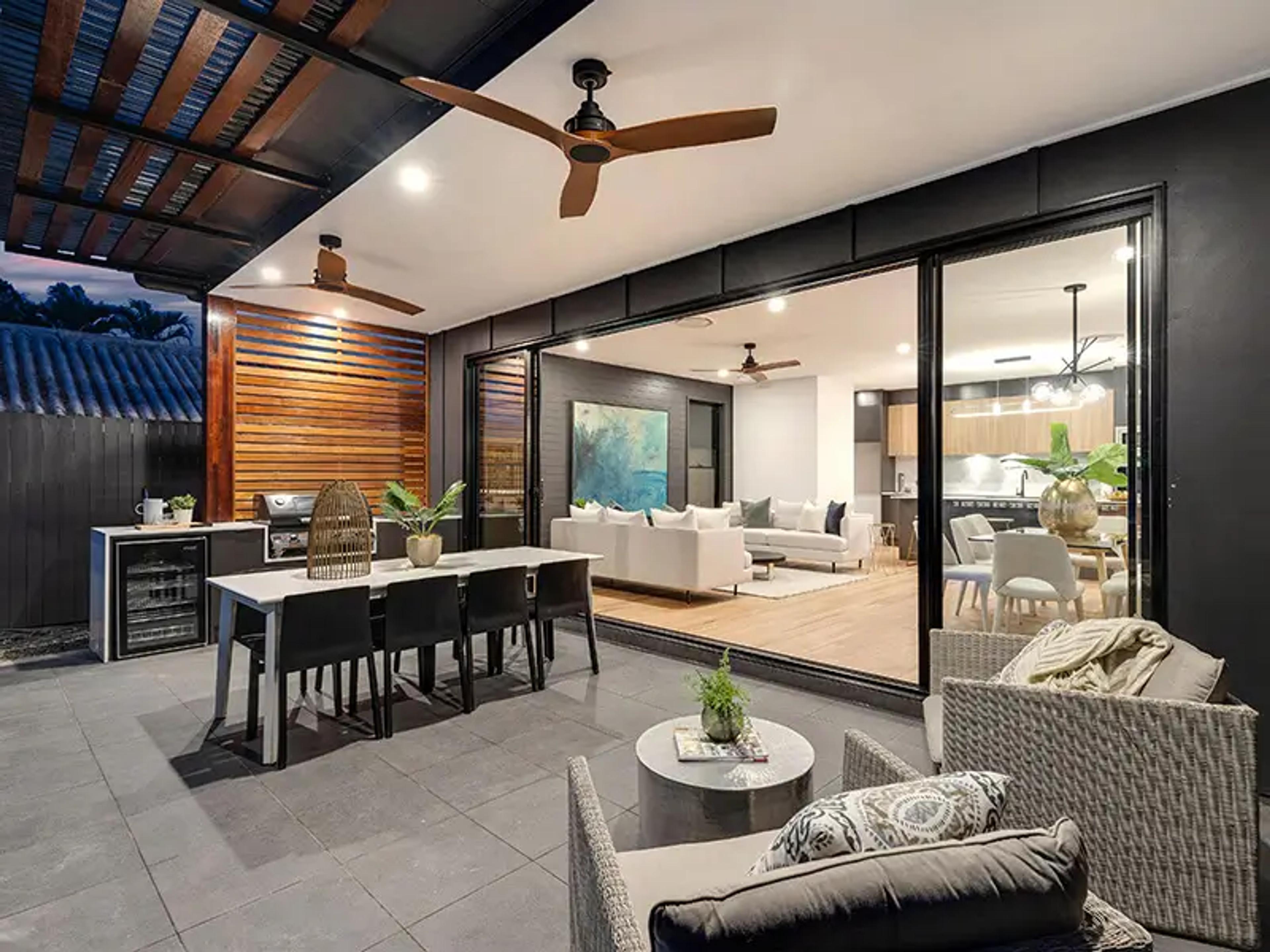Covered outdoor entertaining area with dining and lounge