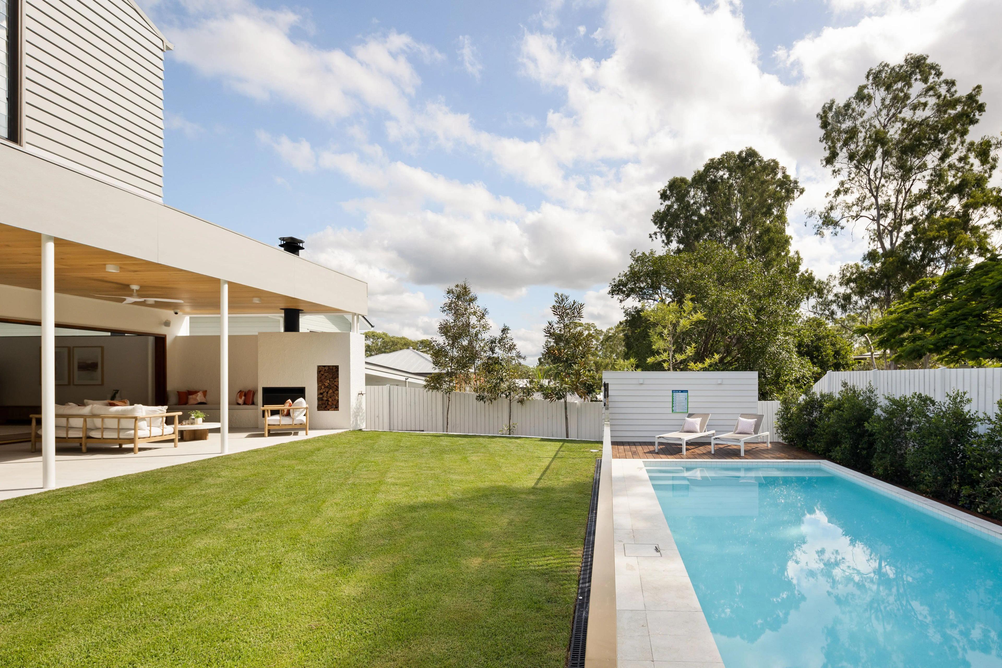 Rear garden with lawn, pool and covered outdoor living area