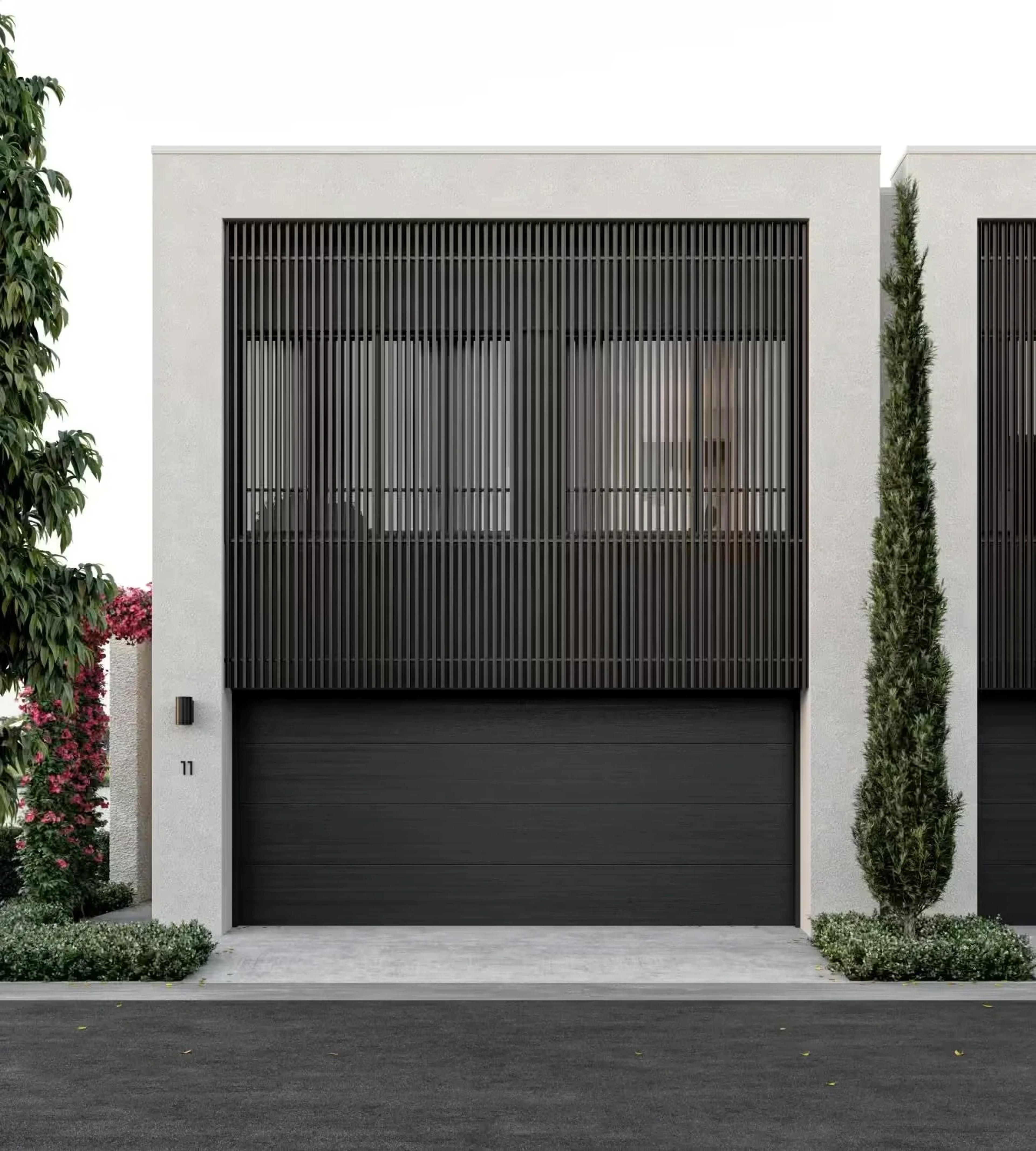 Townhouse street frontage with garage and vertical screen facade