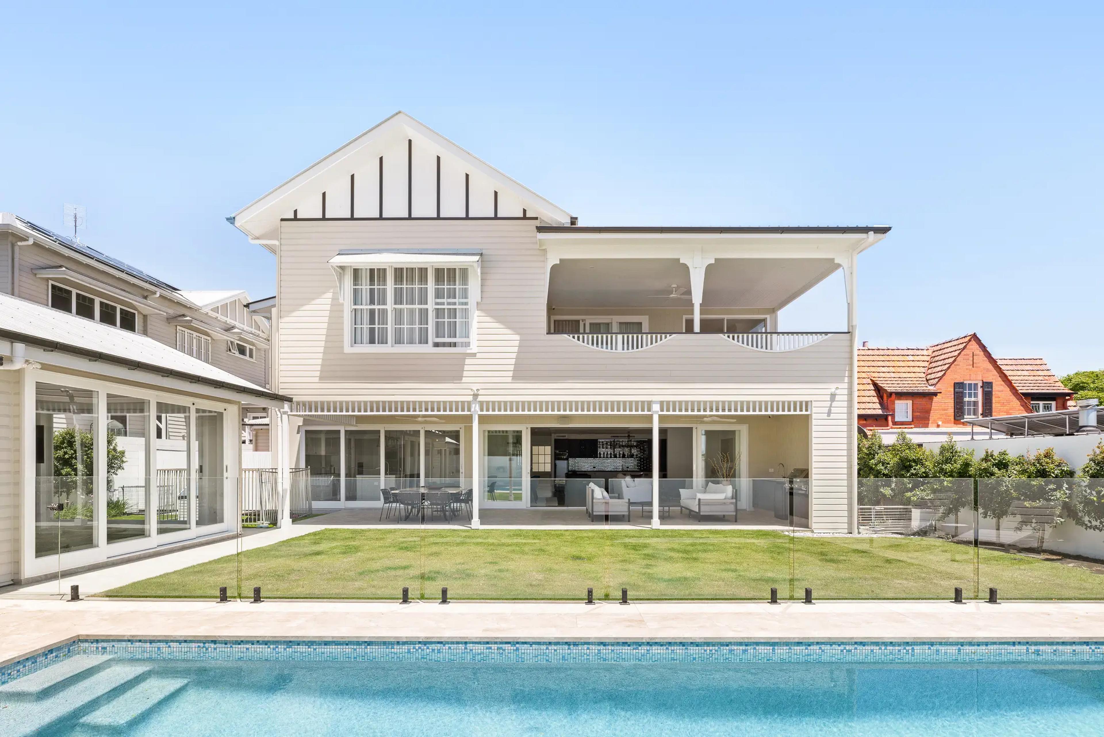 Rear exterior of home with verandah and swimming pool