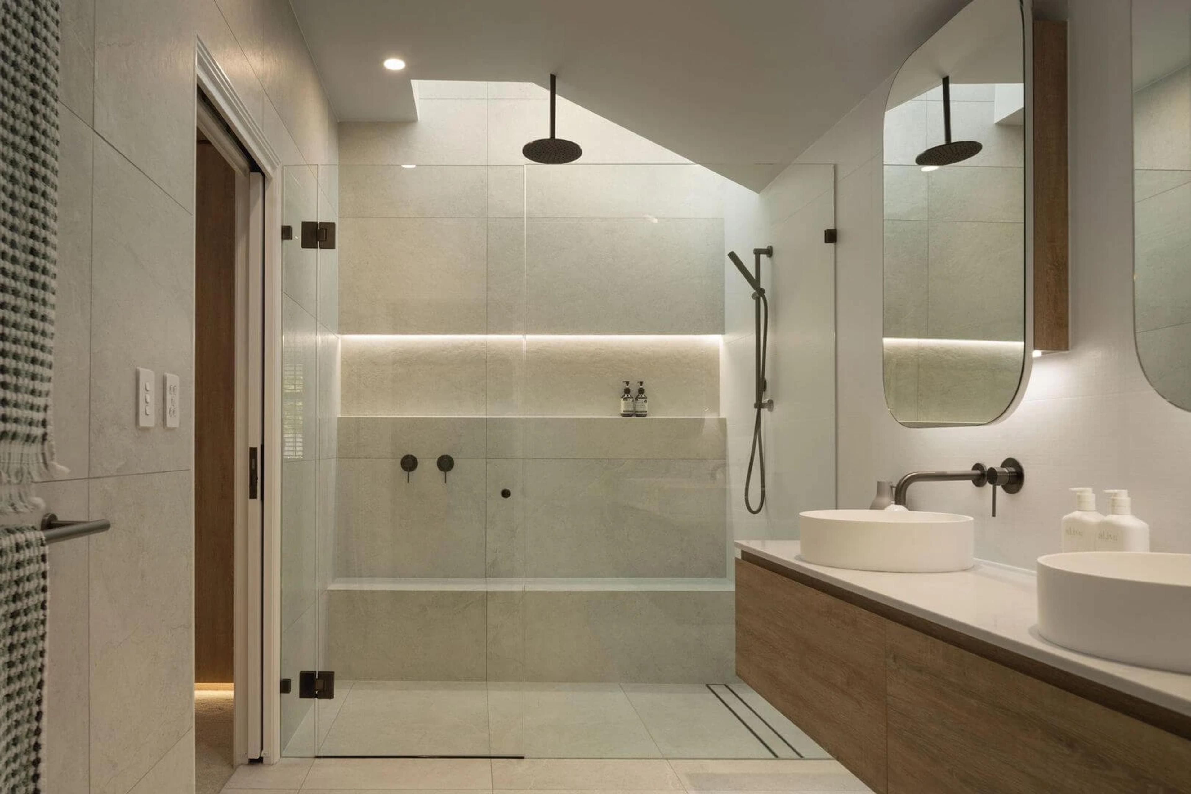 Ensuite with double vanity, walk in shower and mirrors