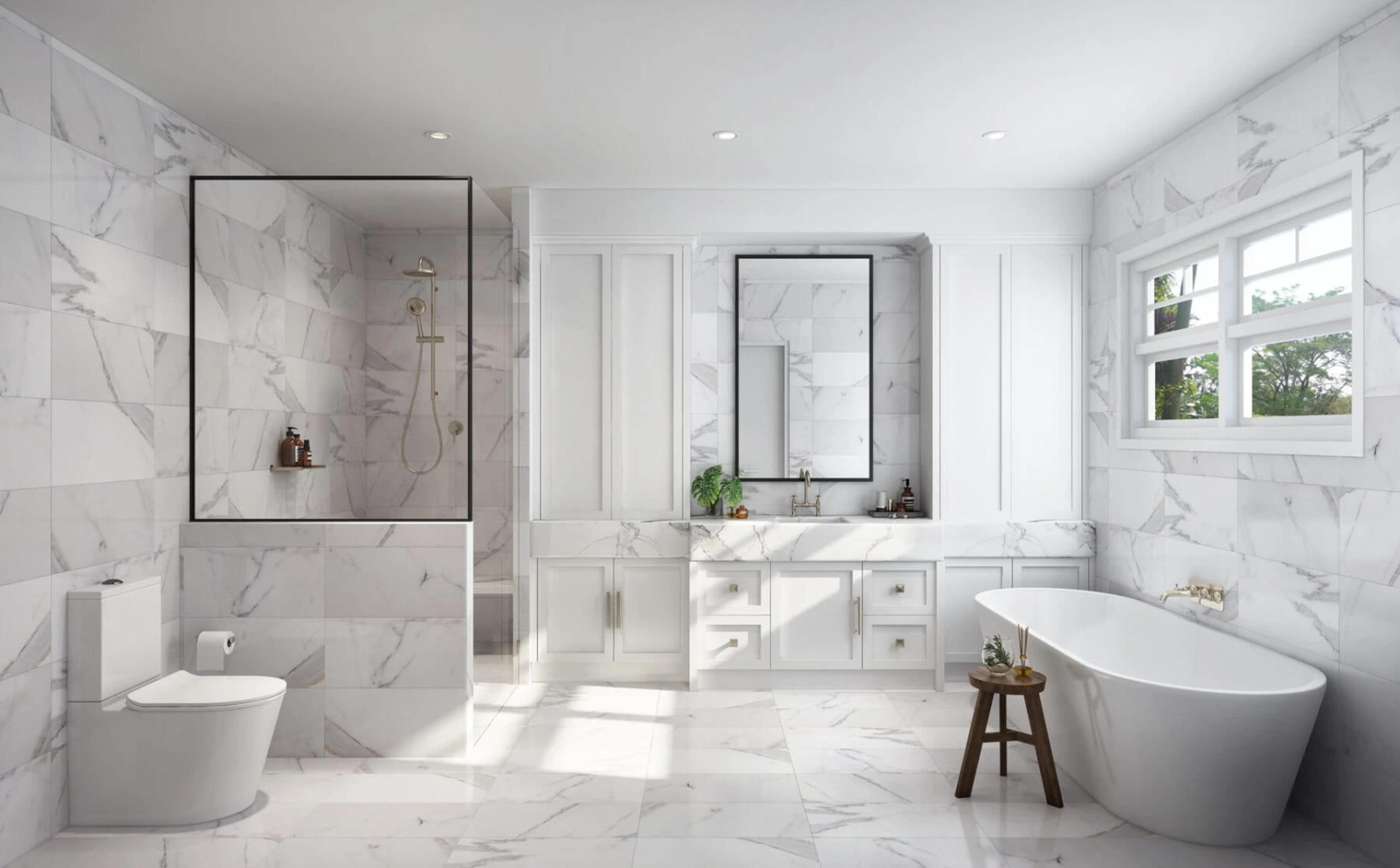 Marble bathroom with freestanding tub and glass shower