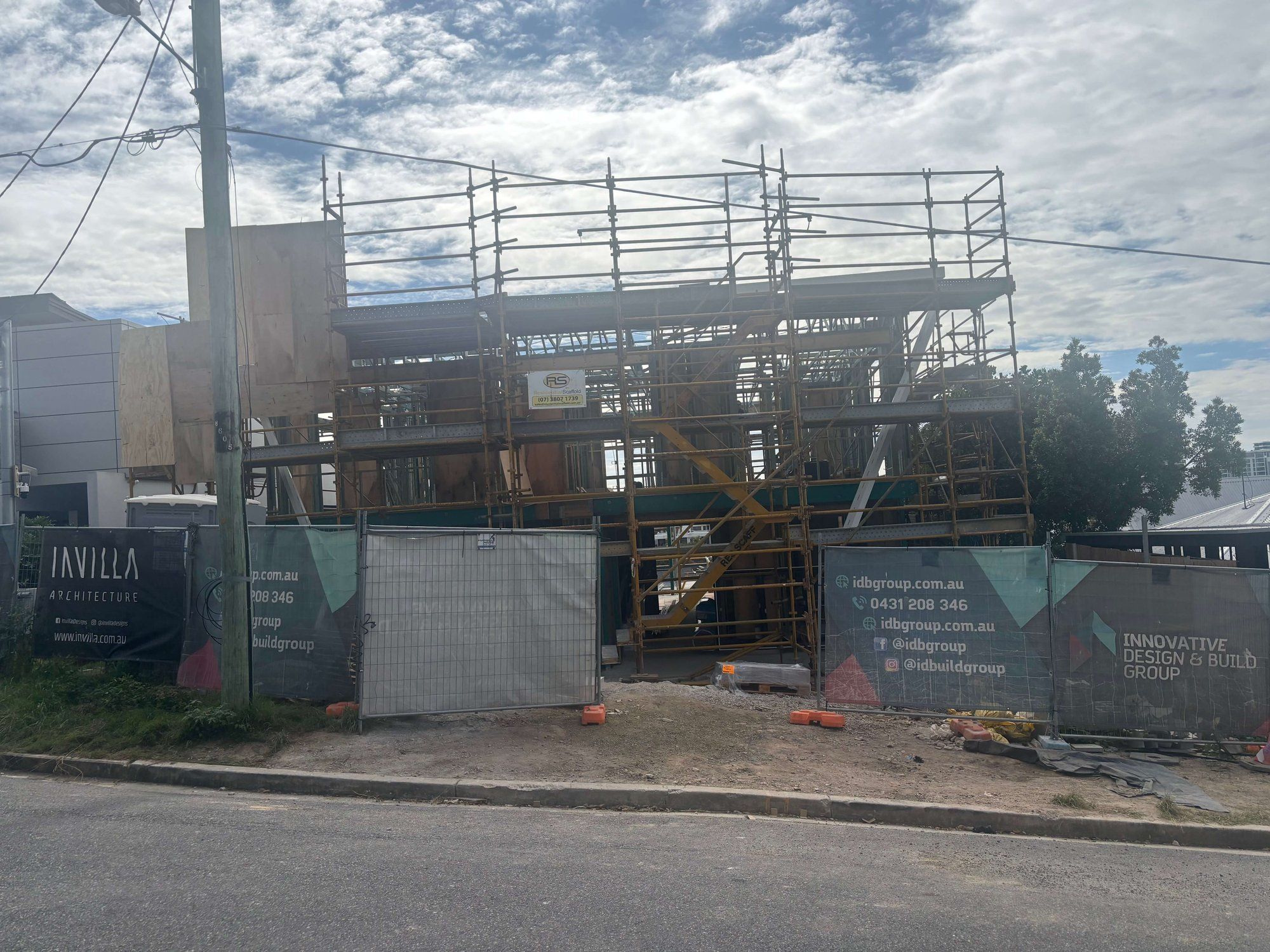 A secured construction site by Invilla Architecture preparing for a knock-down rebuild and home demolition.