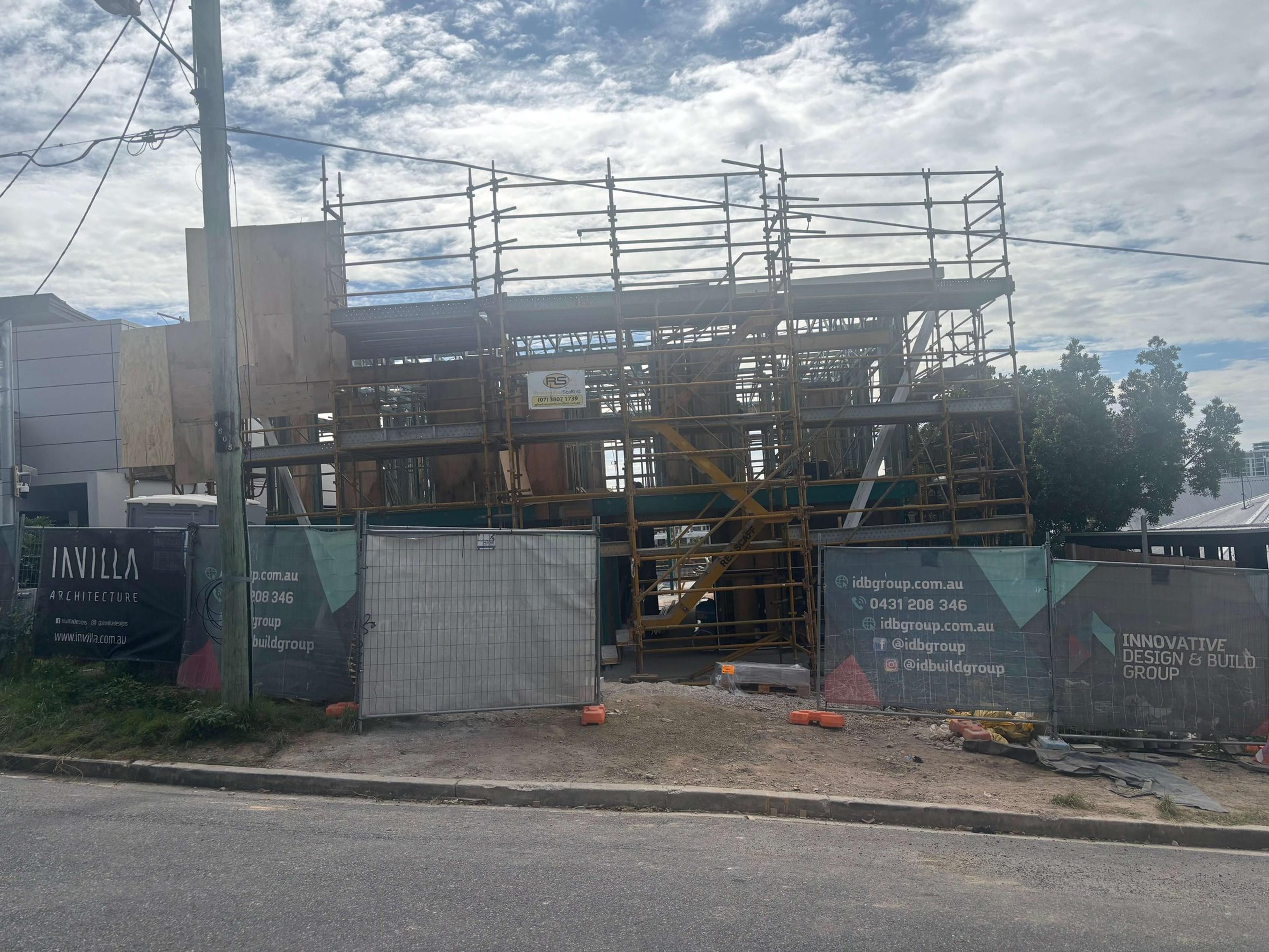 A secured construction site by Invilla Architecture preparing for a knock-down rebuild and home demolition.