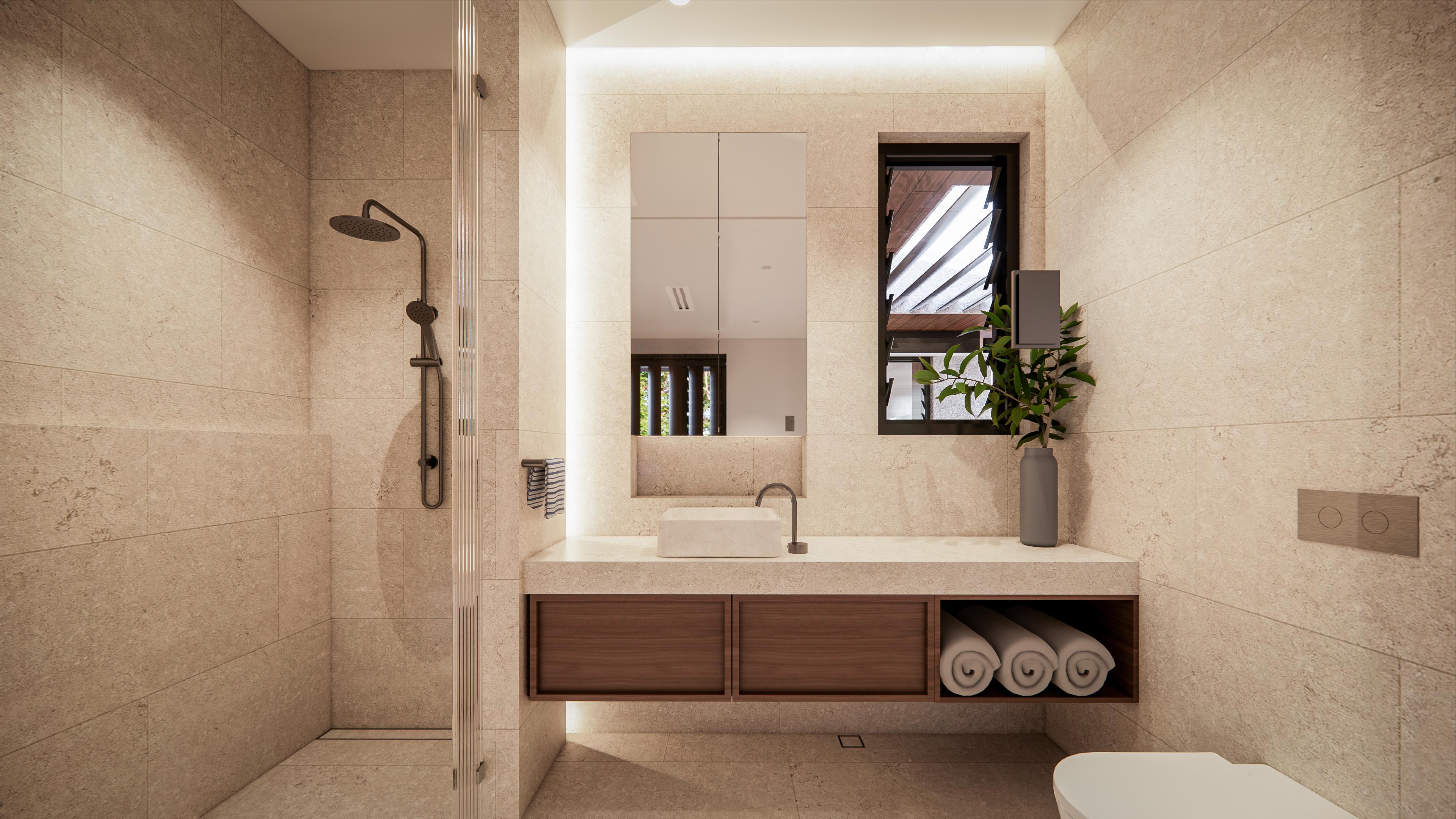 Stone-tiled ensuite with walk-in rain shower, floating walnut vanity, rolled towels and a louvred window