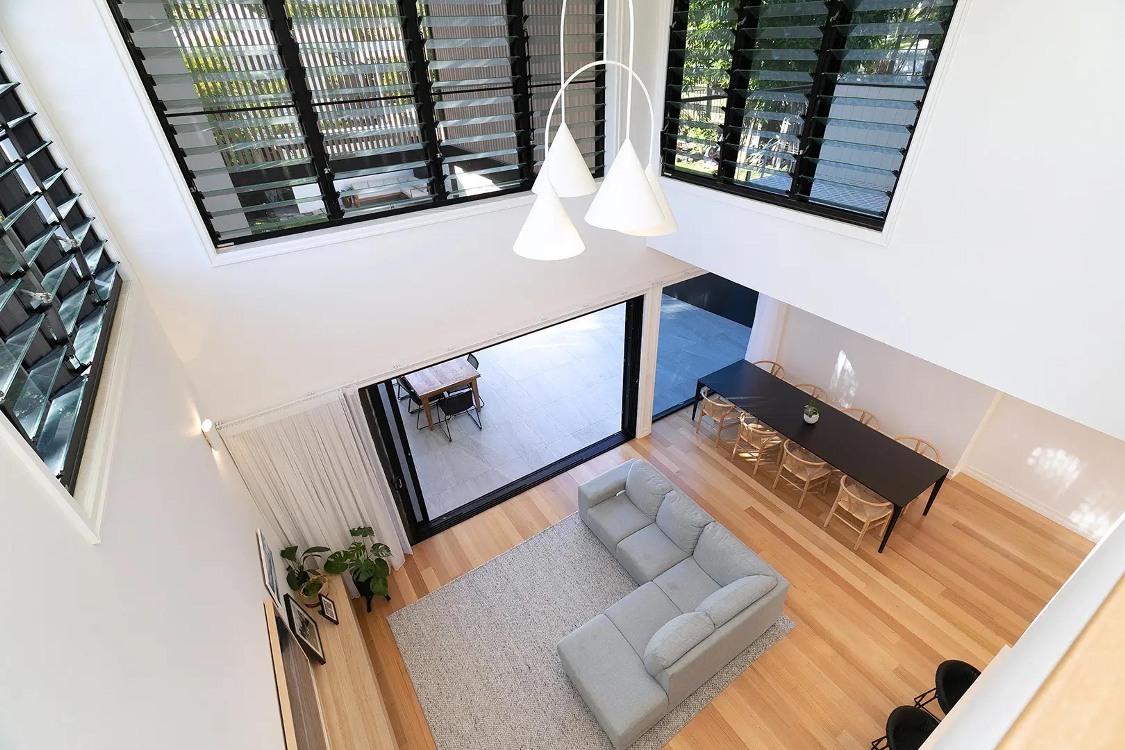 Living and dining area seen from mezzanine void above