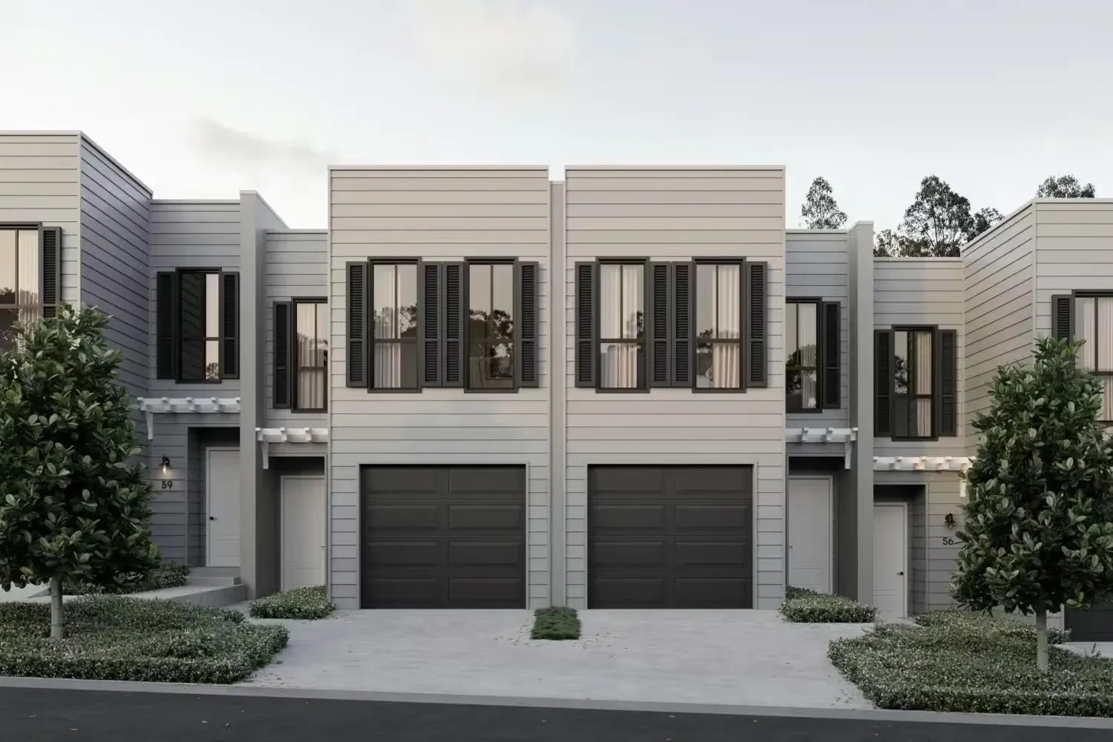 Townhouses with windows and single garages