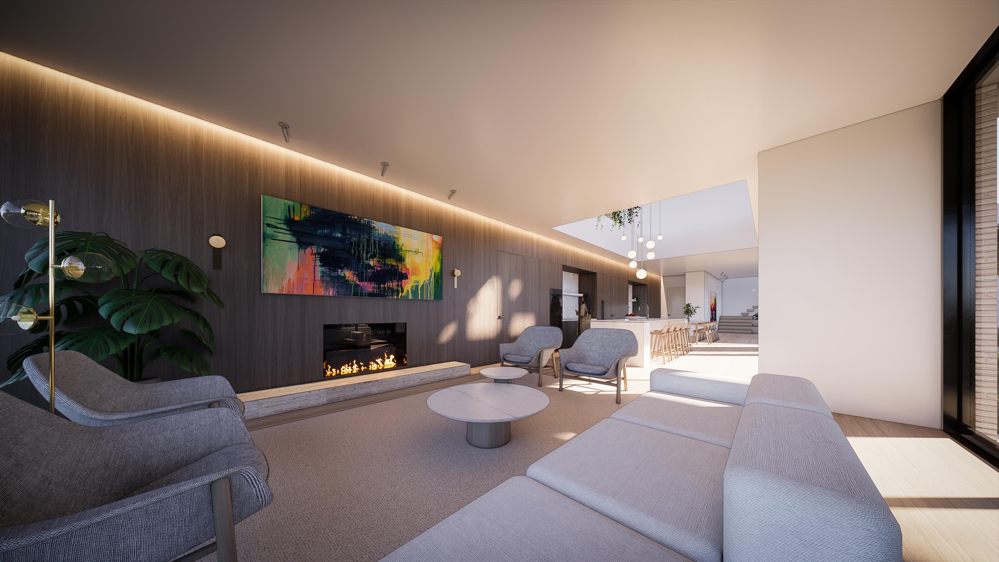 Living area looking through to the kitchen, with grey lounge chairs, artwork and warm timber panelling under a void