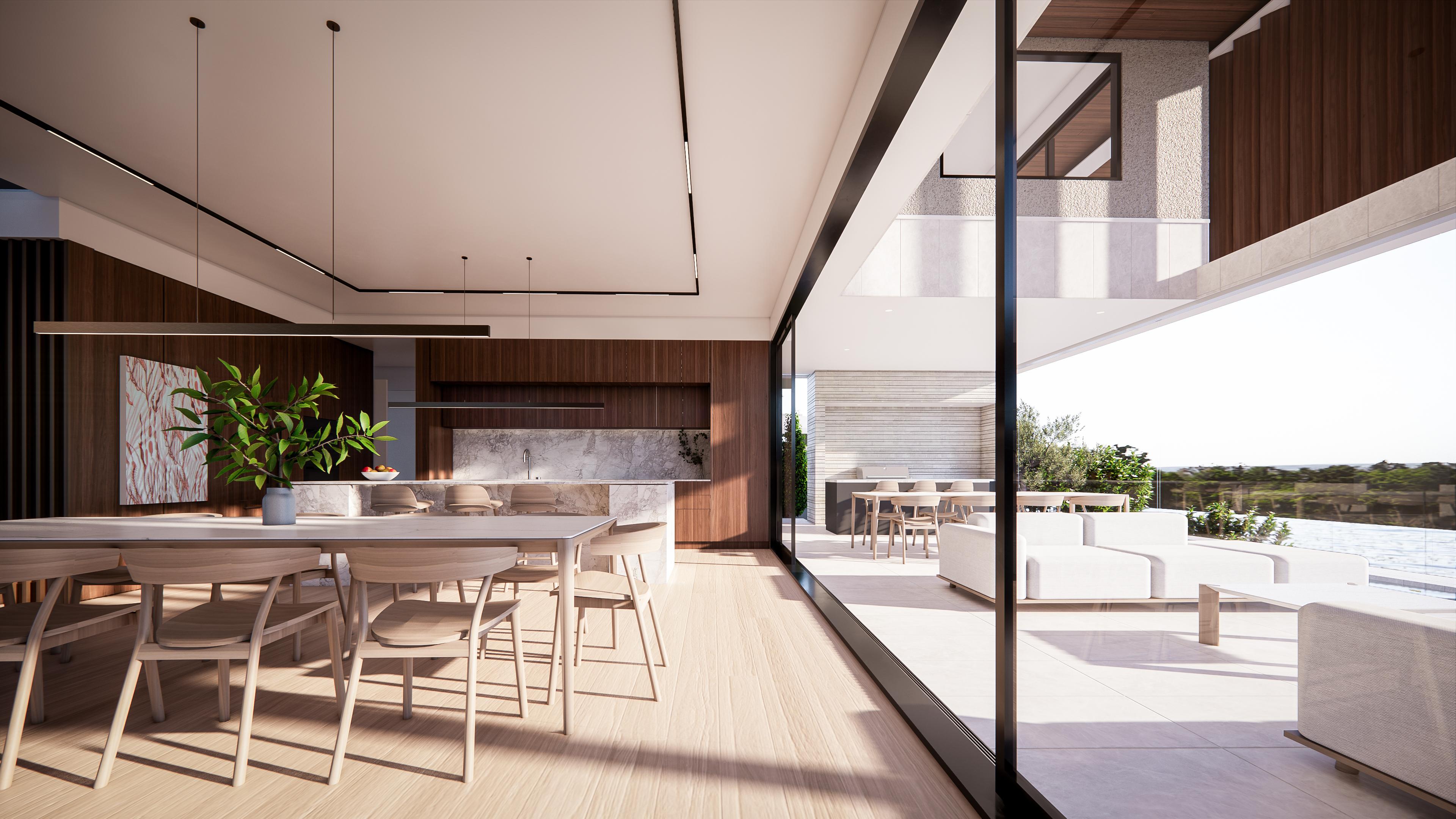 Dining table and walnut kitchen with marble island opening to the alfresco and terrace through black glazing