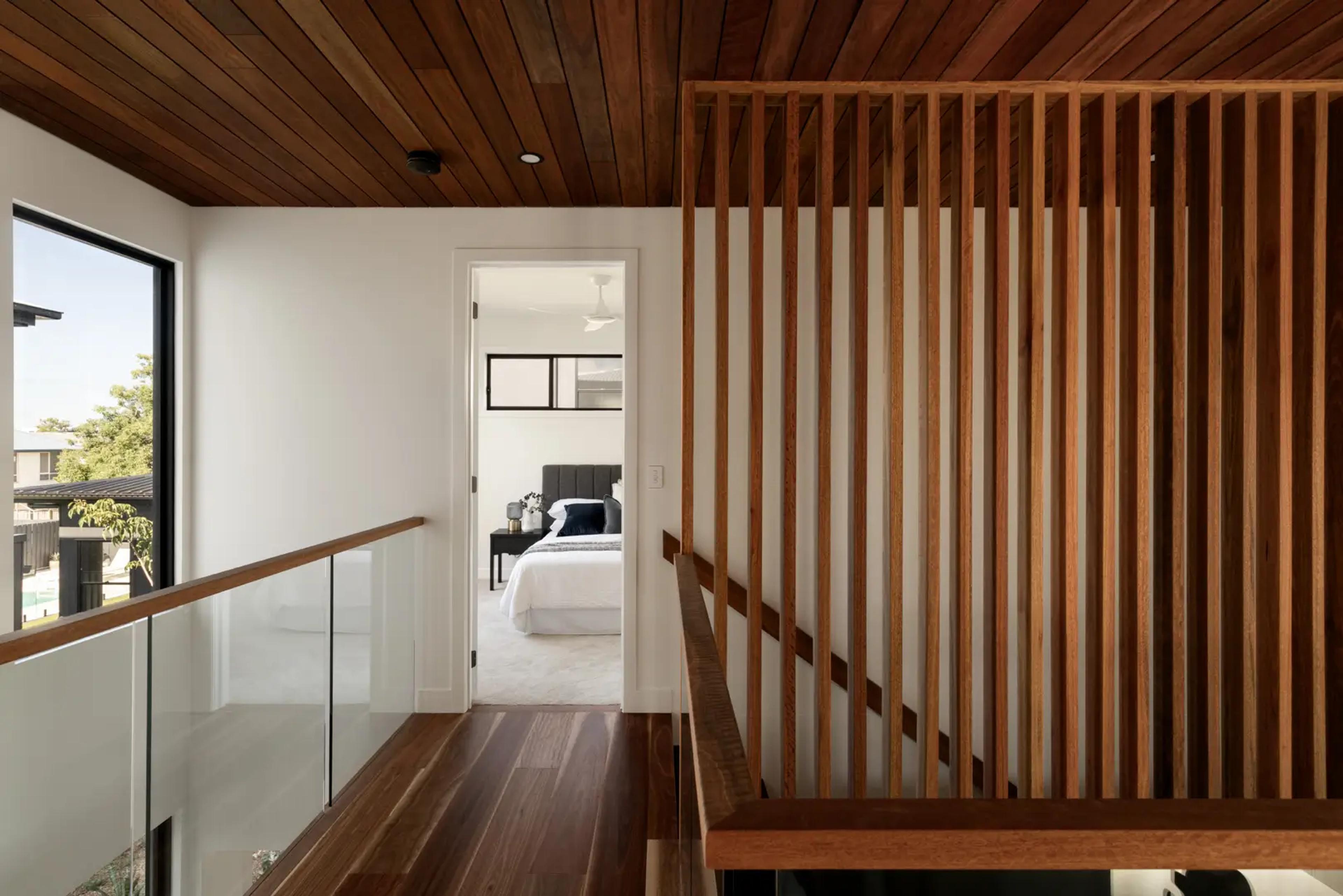 Landing with timber battens and glass balustrade