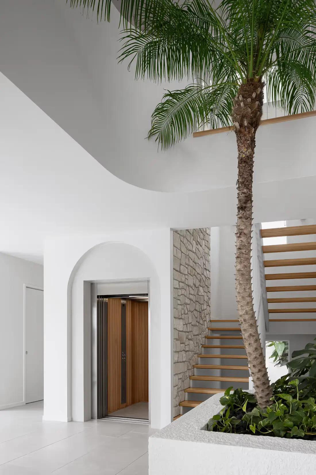 Luxury home with integrated residential lift and staircase