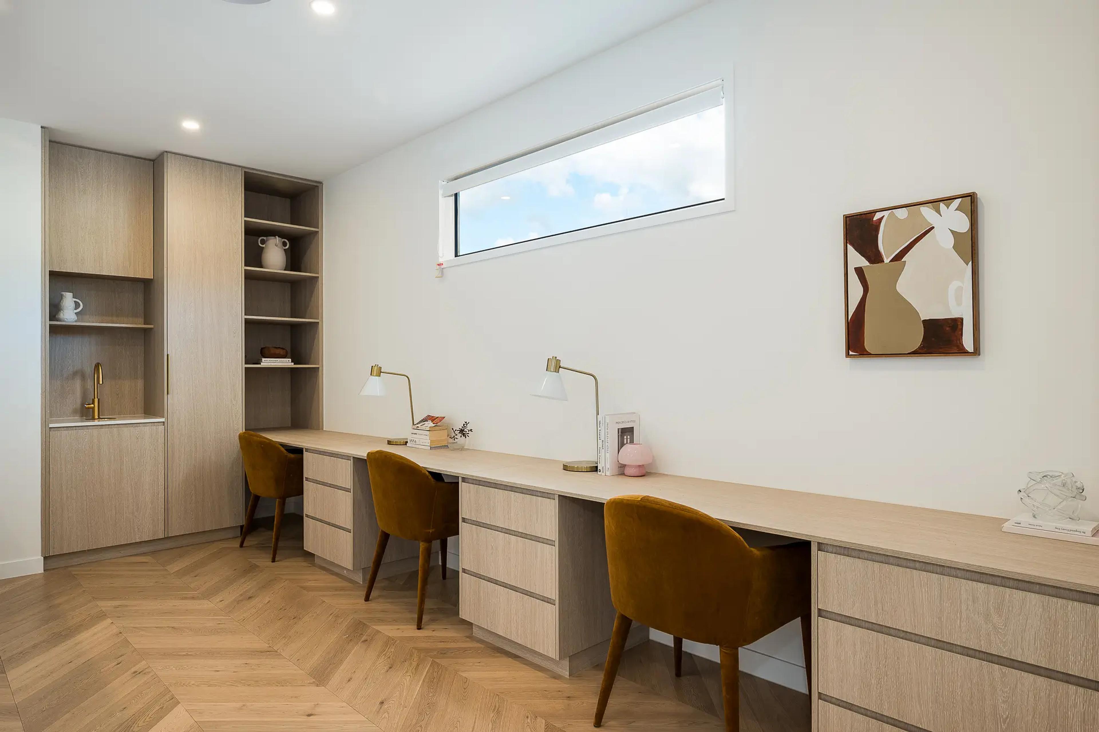 Home study with built-in desk and shelving