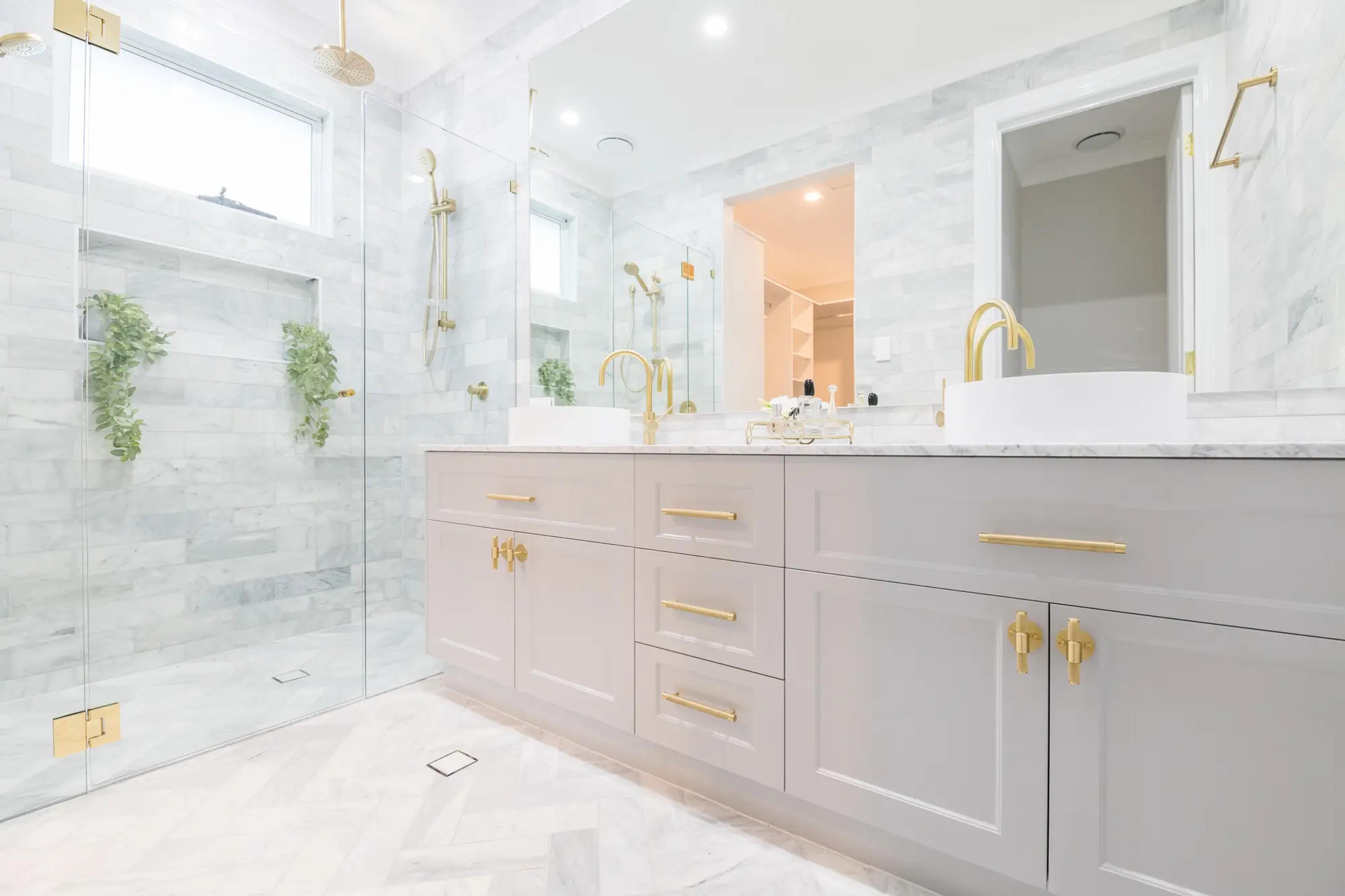 Marble ensuite with double vanity and glass shower