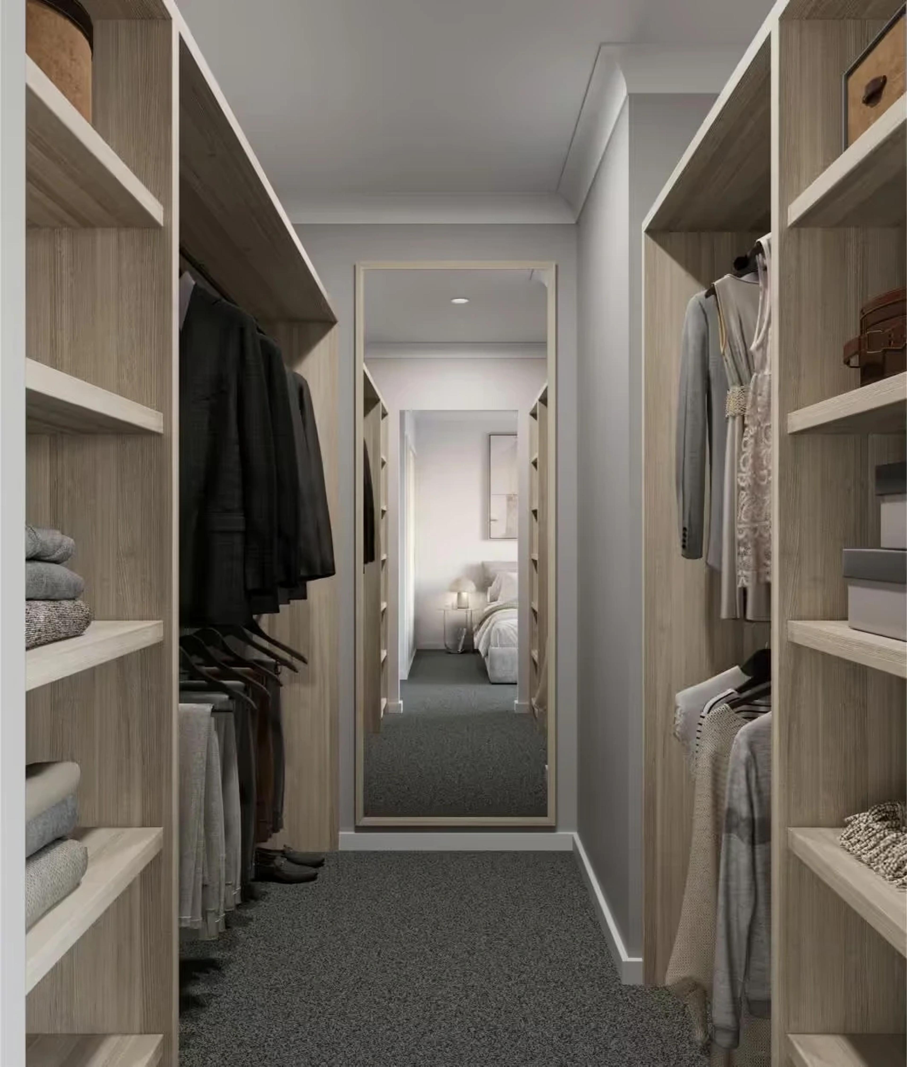 Walk in wardrobe with timber shelving and full length mirror