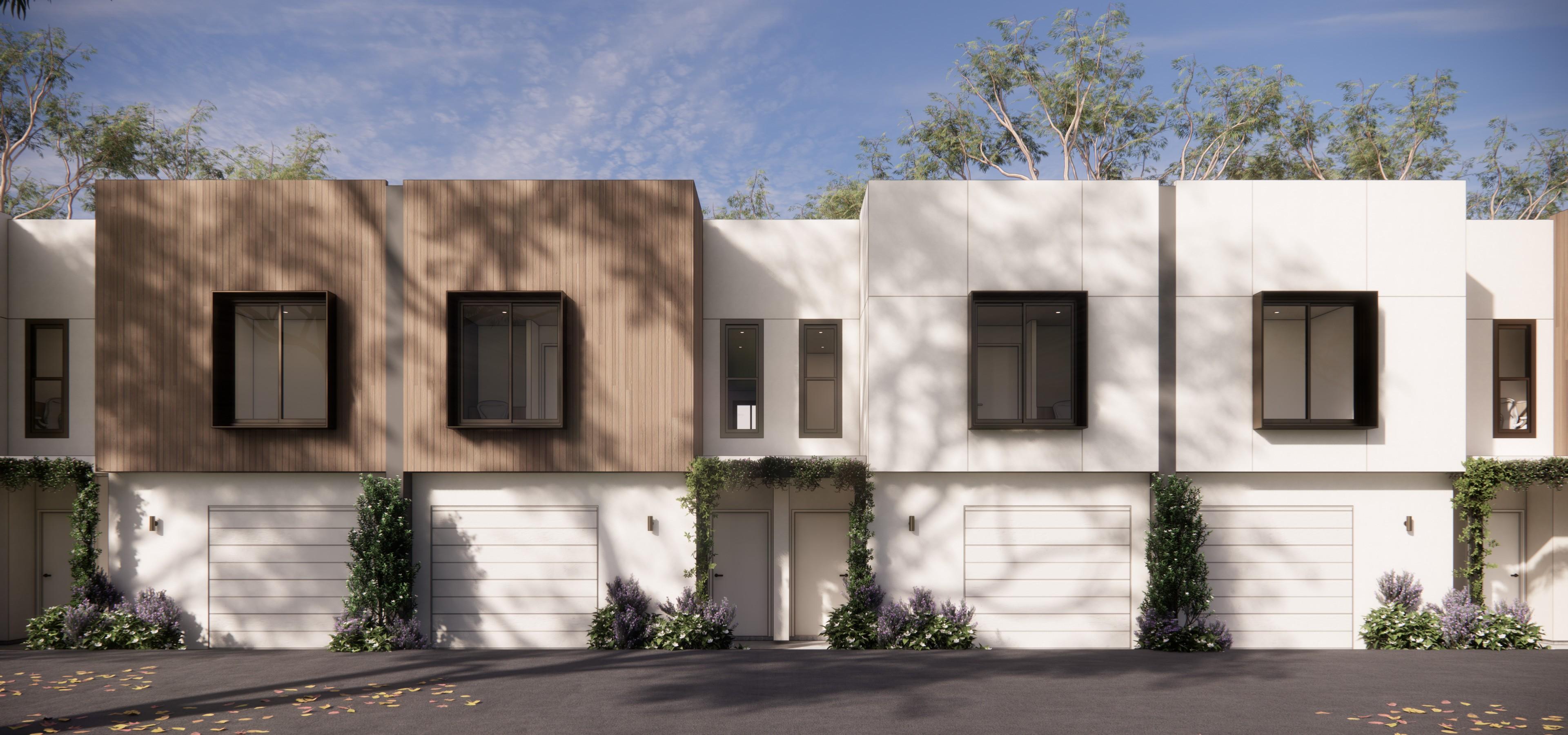 White and timber townhouse facades with garage doors
