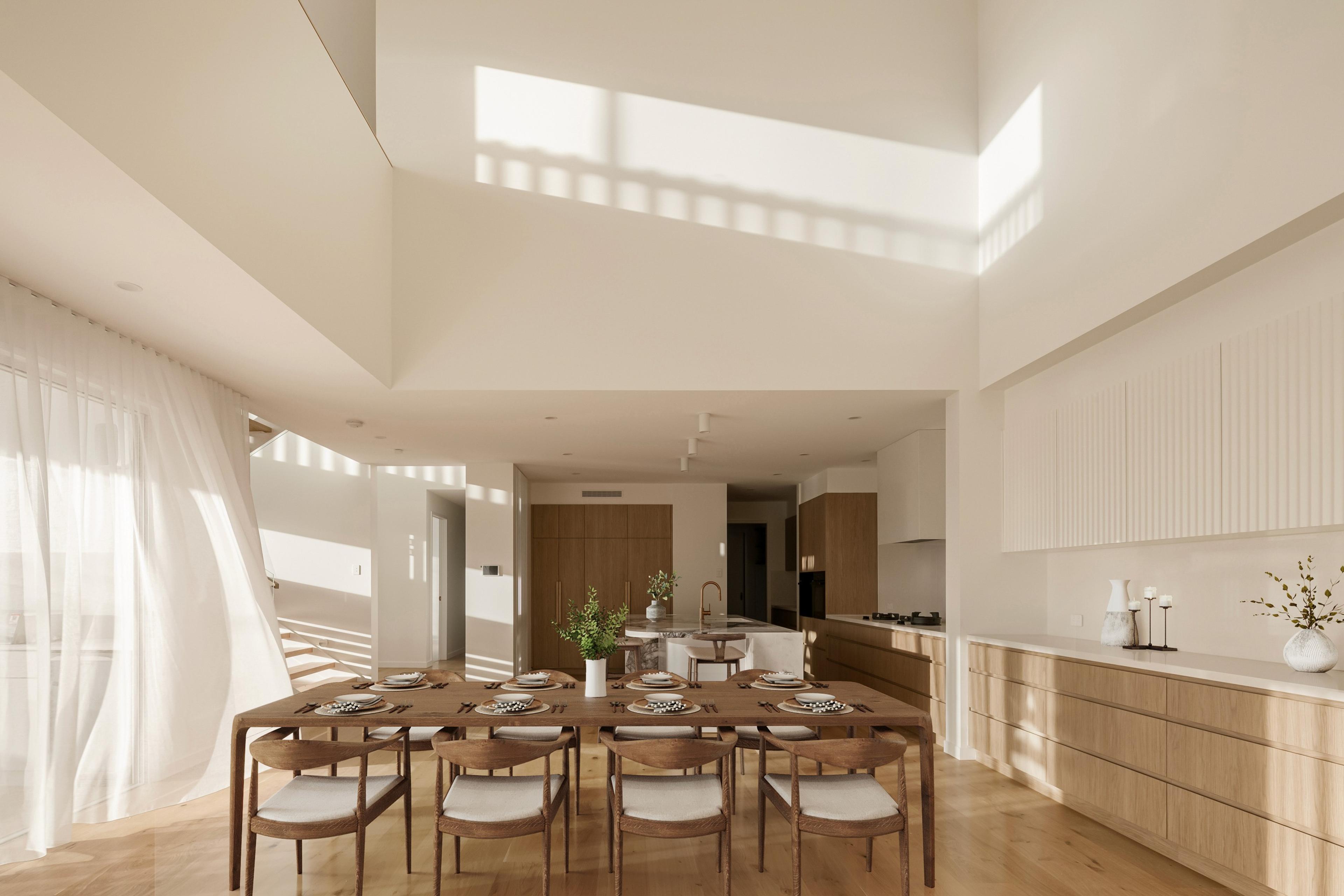 Dining room with timber table under double height void