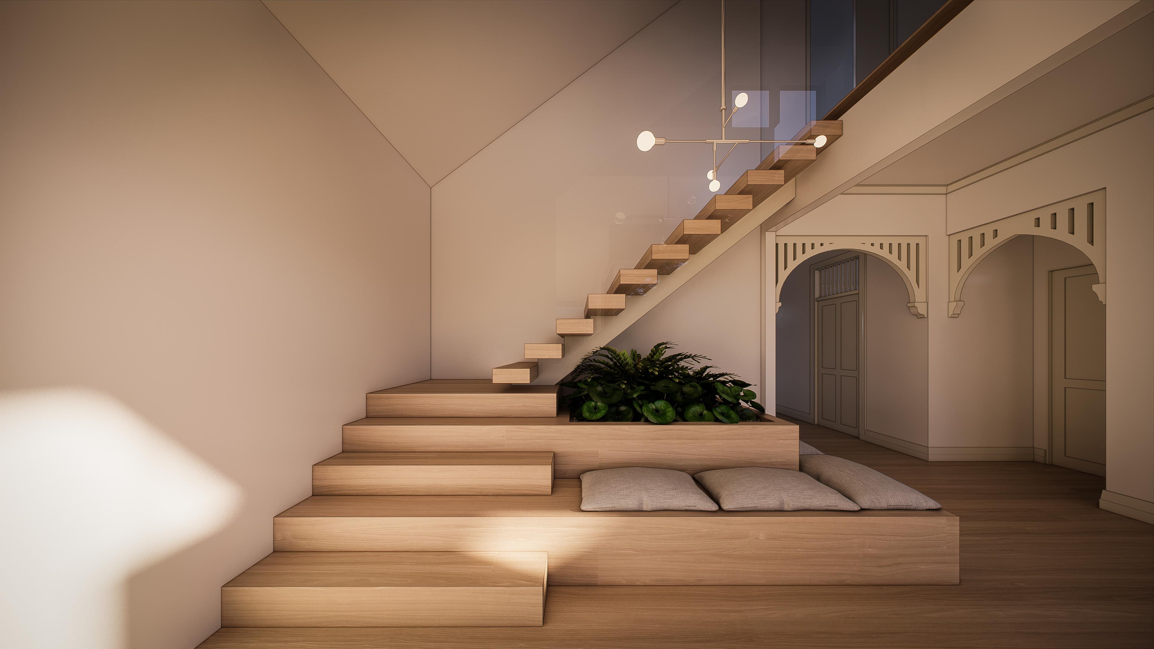 Floating timber staircase with glass balustrade and sculptural pendant beside a heritage arched fretwork doorway