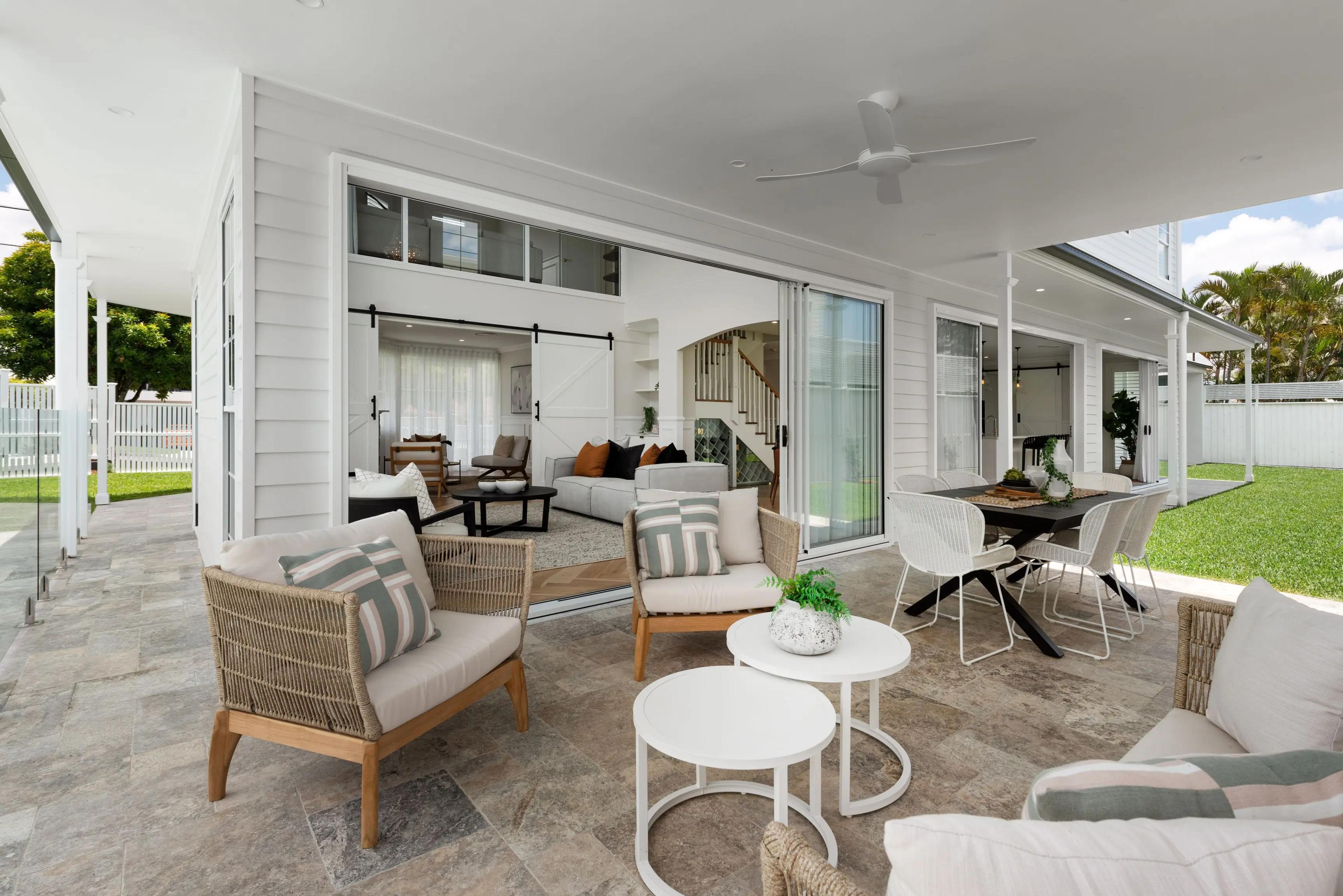 Alfresco lounge with wicker seating opening to living room
