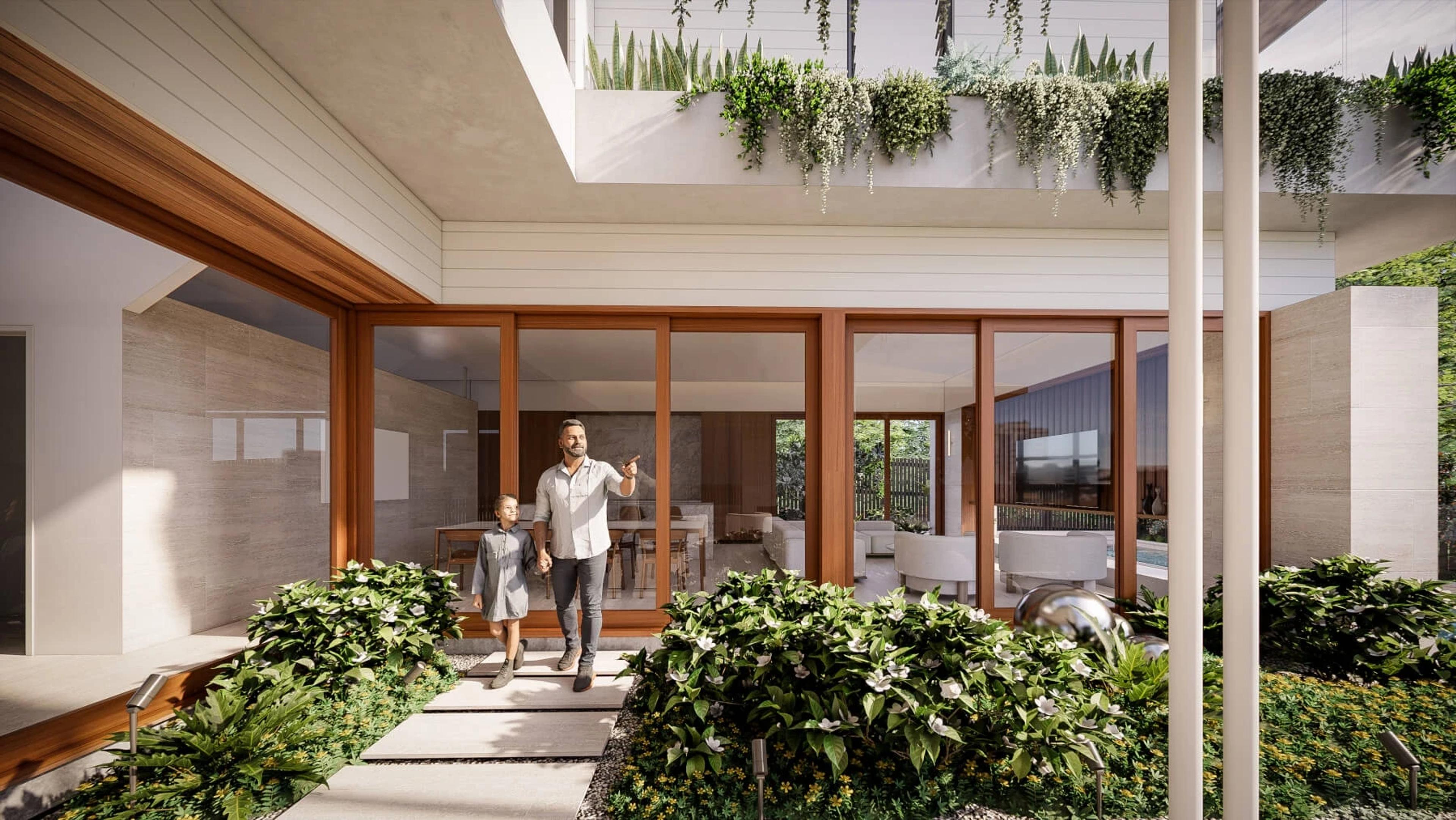 Landscaped internal courtyard with sliding glass doors and hanging plants