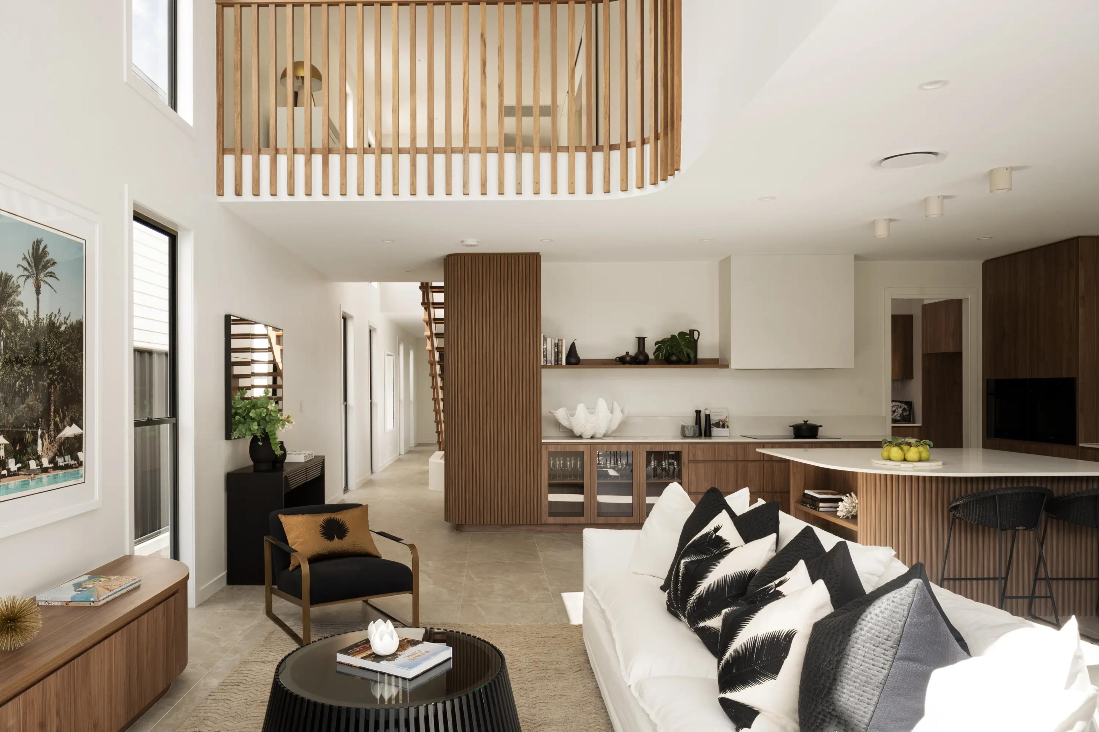 Open plan living, kitchen and void with timber screen