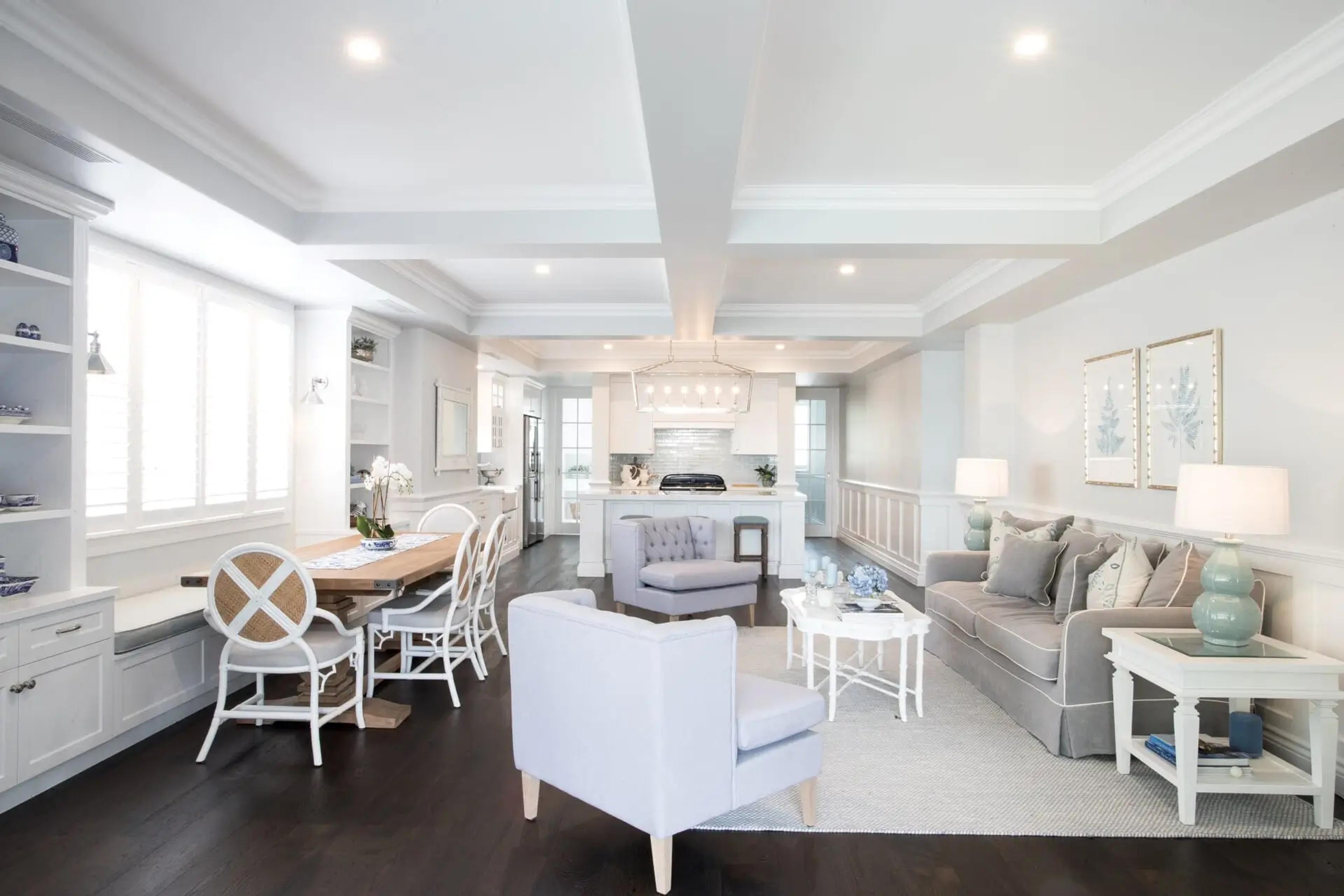 Open plan living and dining room with white coffered ceiling