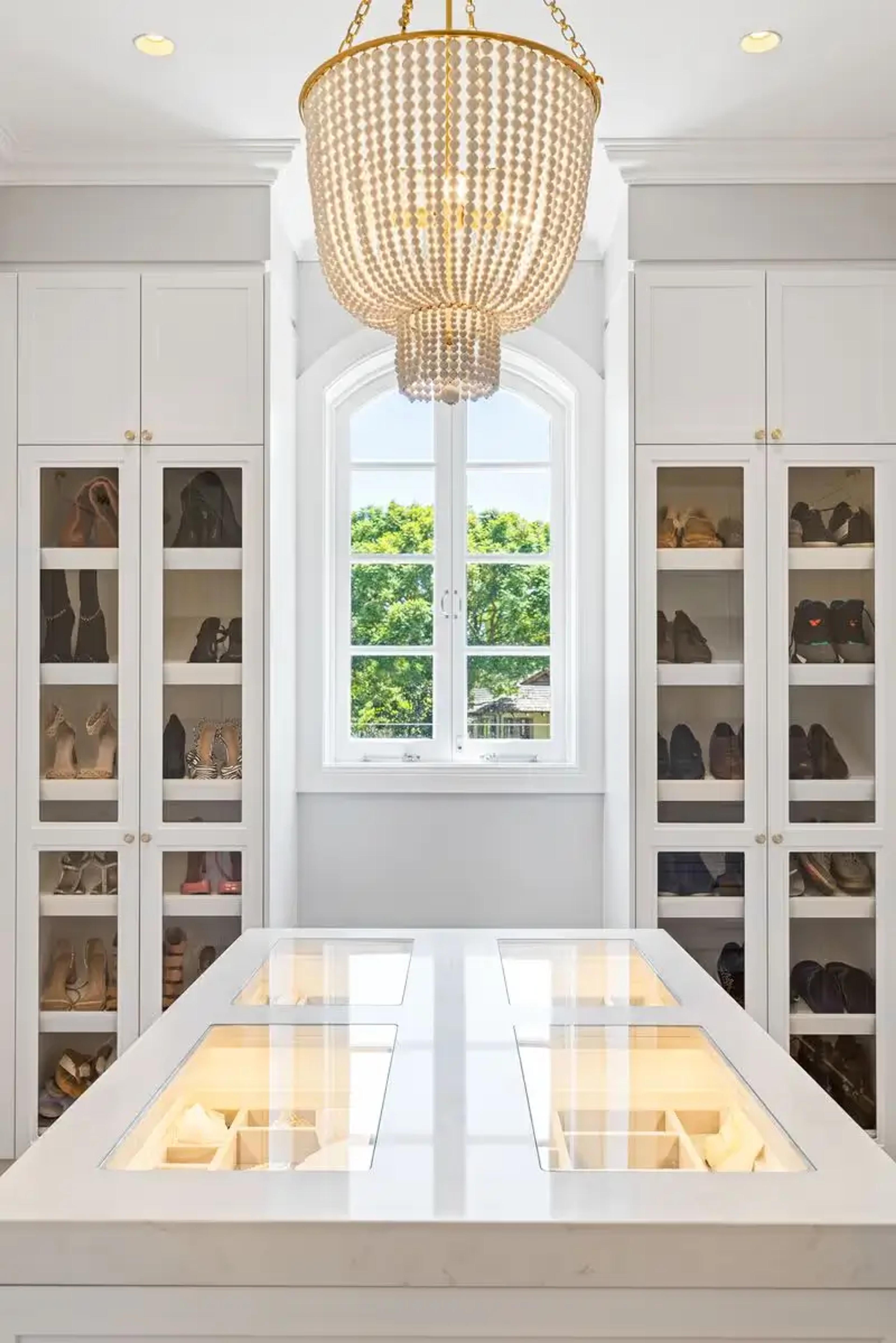 Bespoke custom dual walk in wardrobes with high end joinery