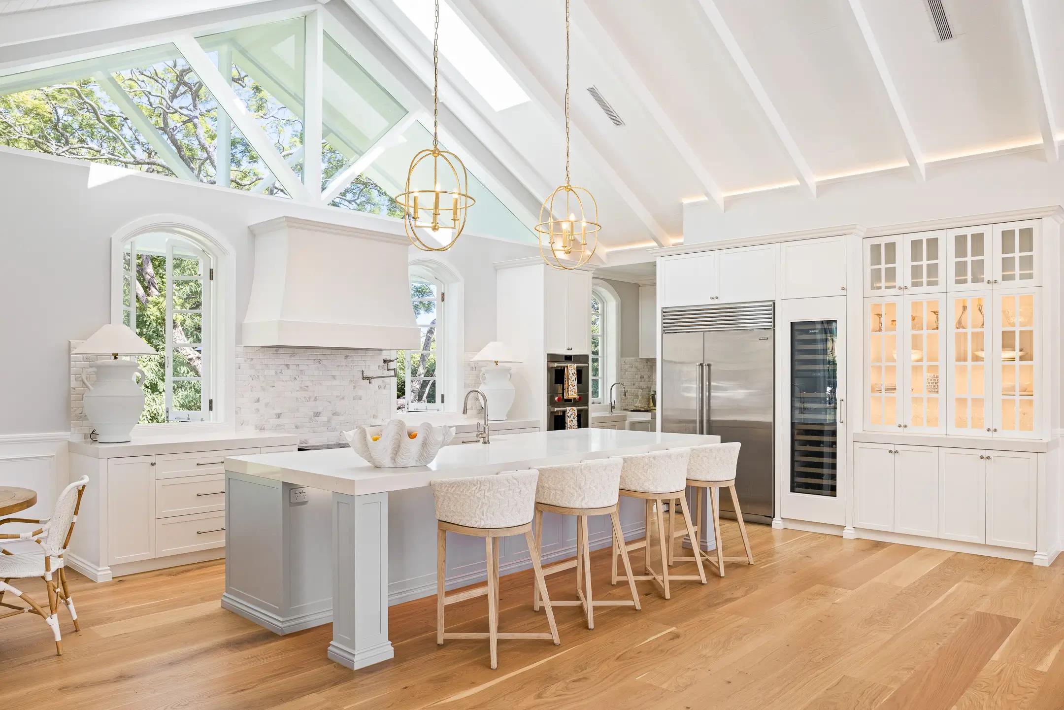 Luxury kitchen design featuring custom cabinetry, which impacts building costs per square metre.