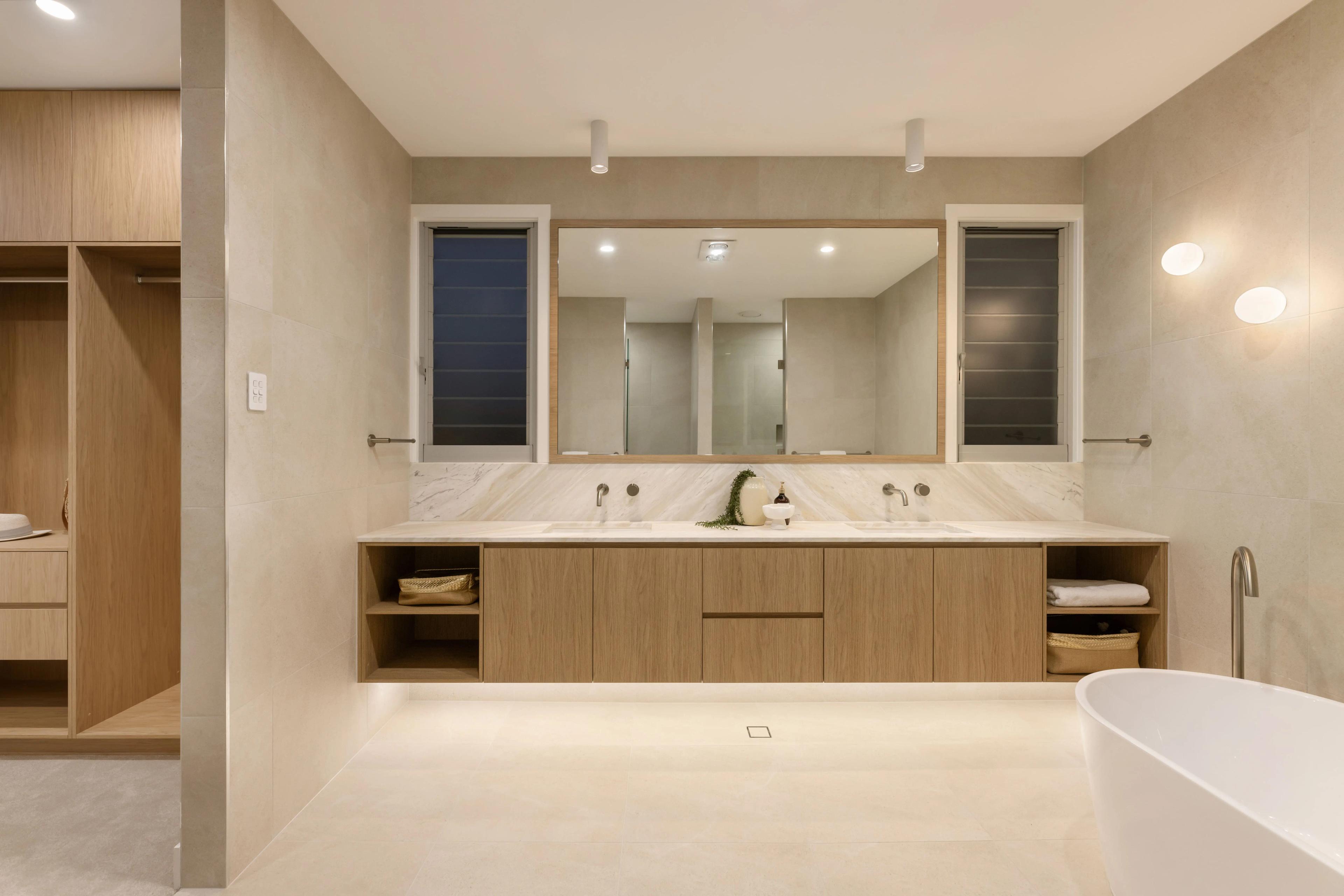 Ensuite bathroom with double vanity and freestanding bath