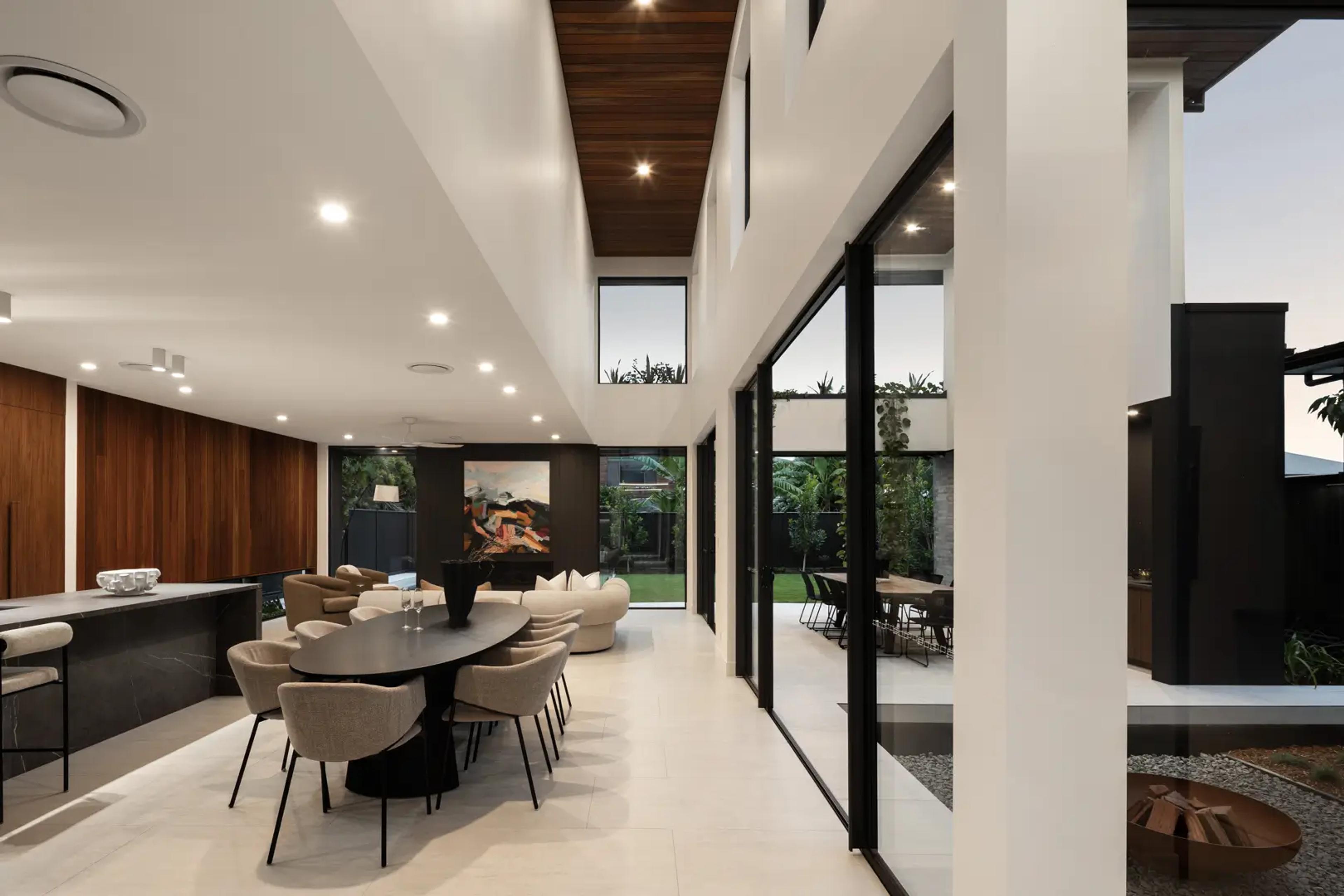 Hallway with feature artwork and timber staircase