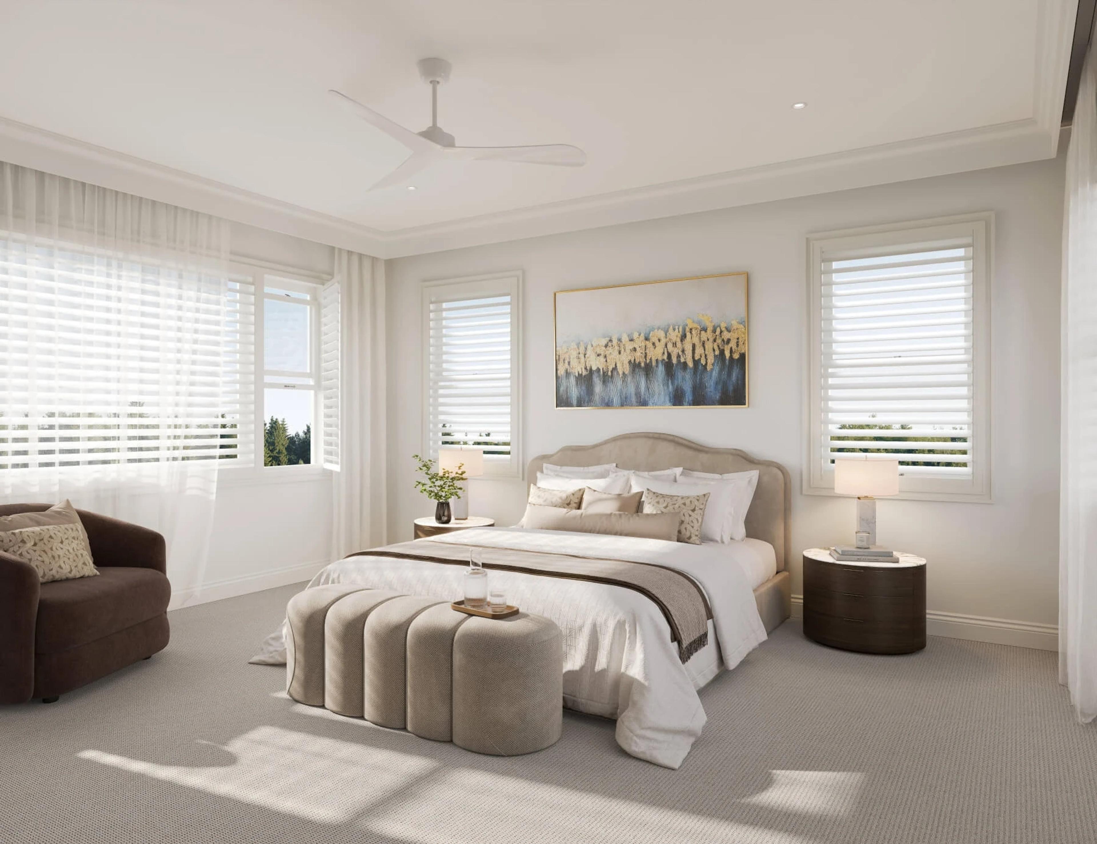 Main bedroom with upholstered bed and shuttered windows