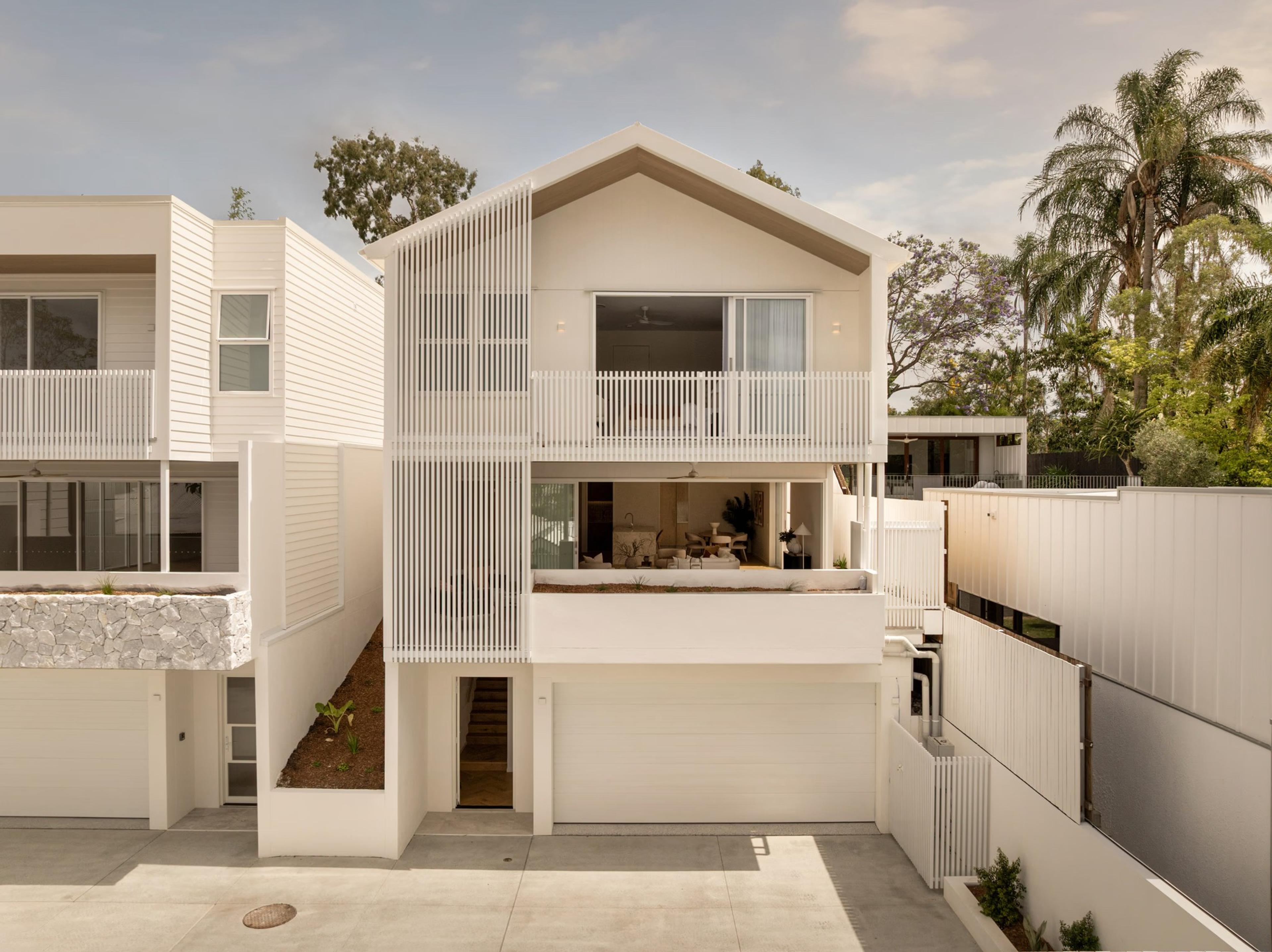 Street front facade with garage, balcony and gabled roof