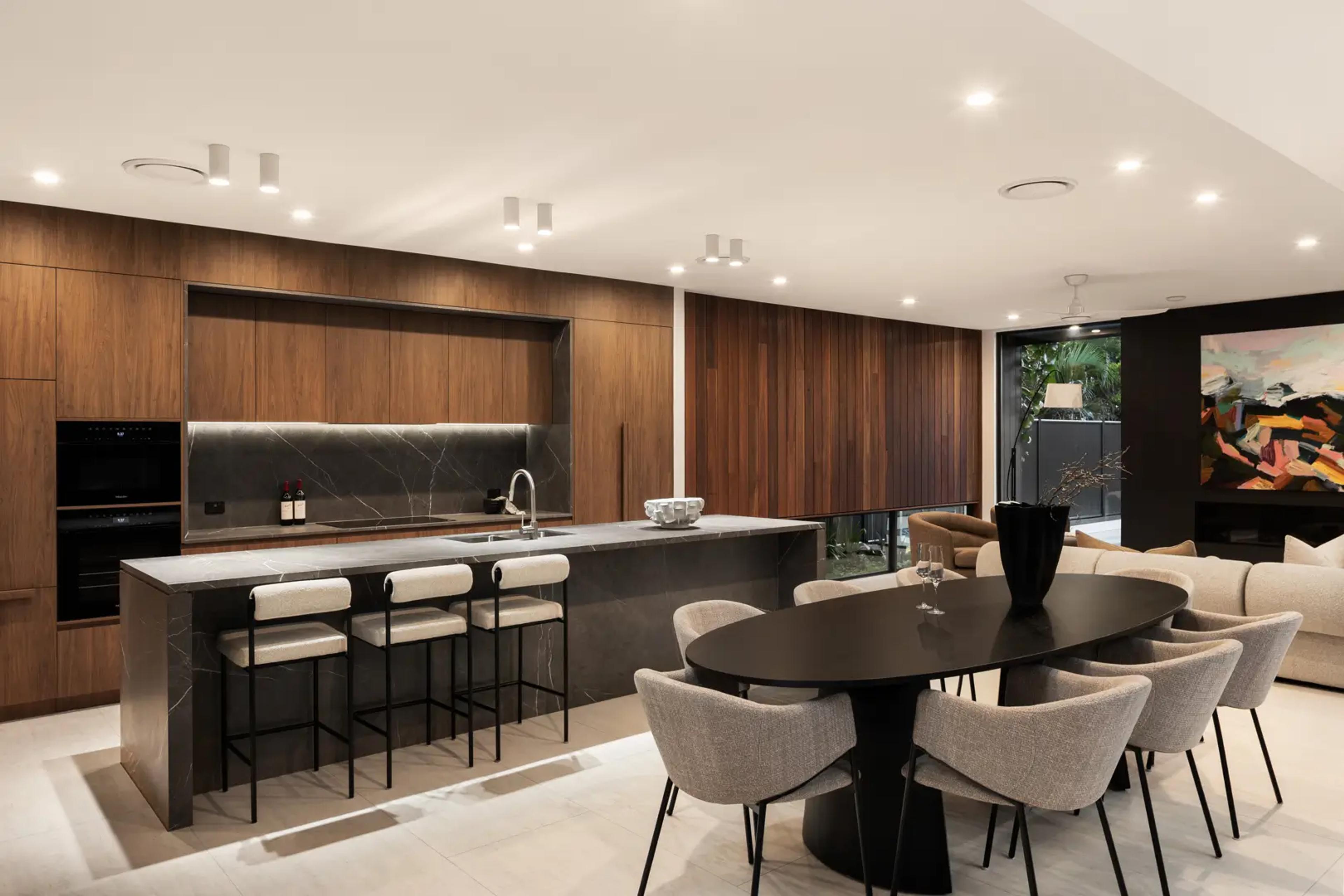 Kitchen with stone island and timber joinery