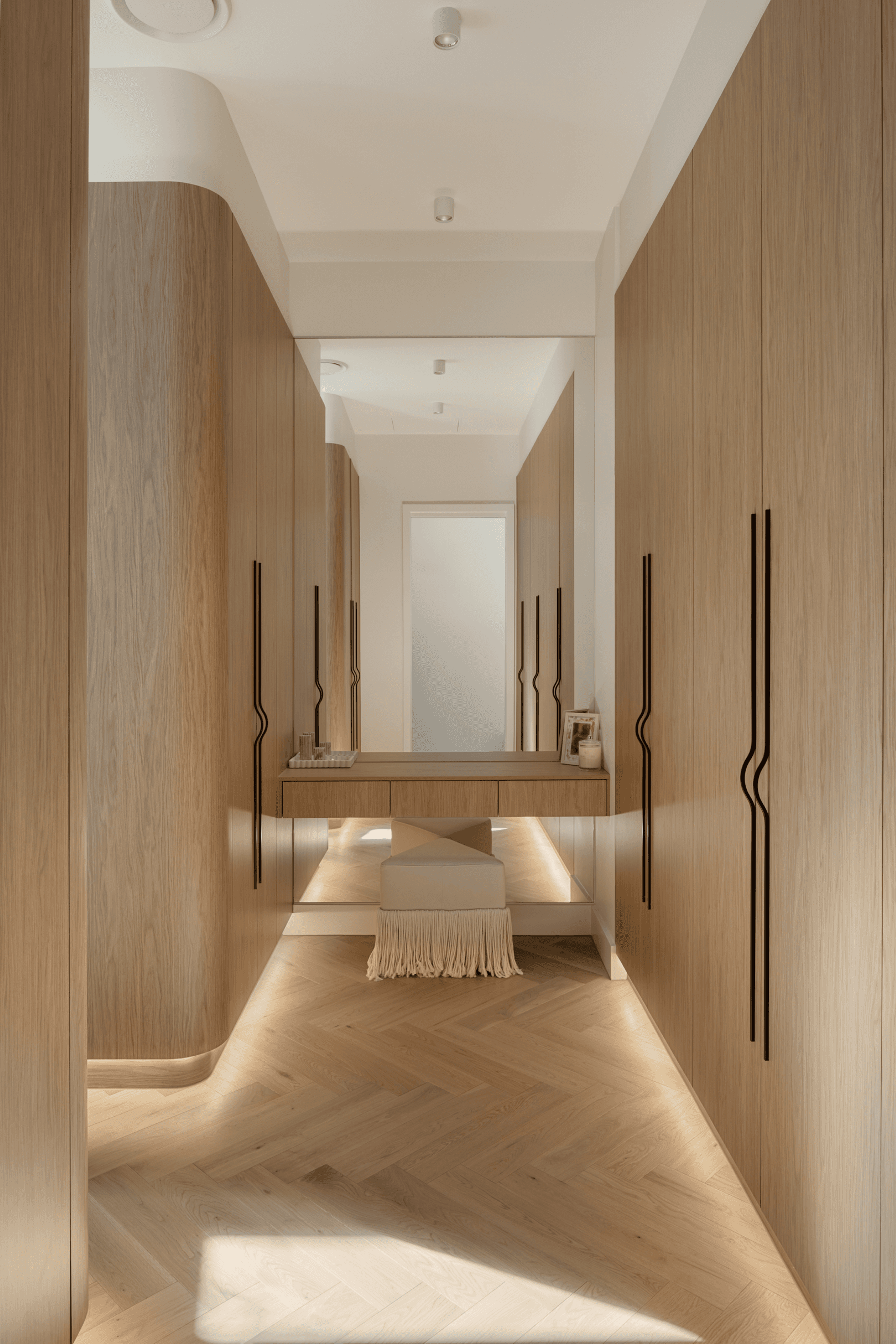 Dressing room with timber joinery, mirror and dresser