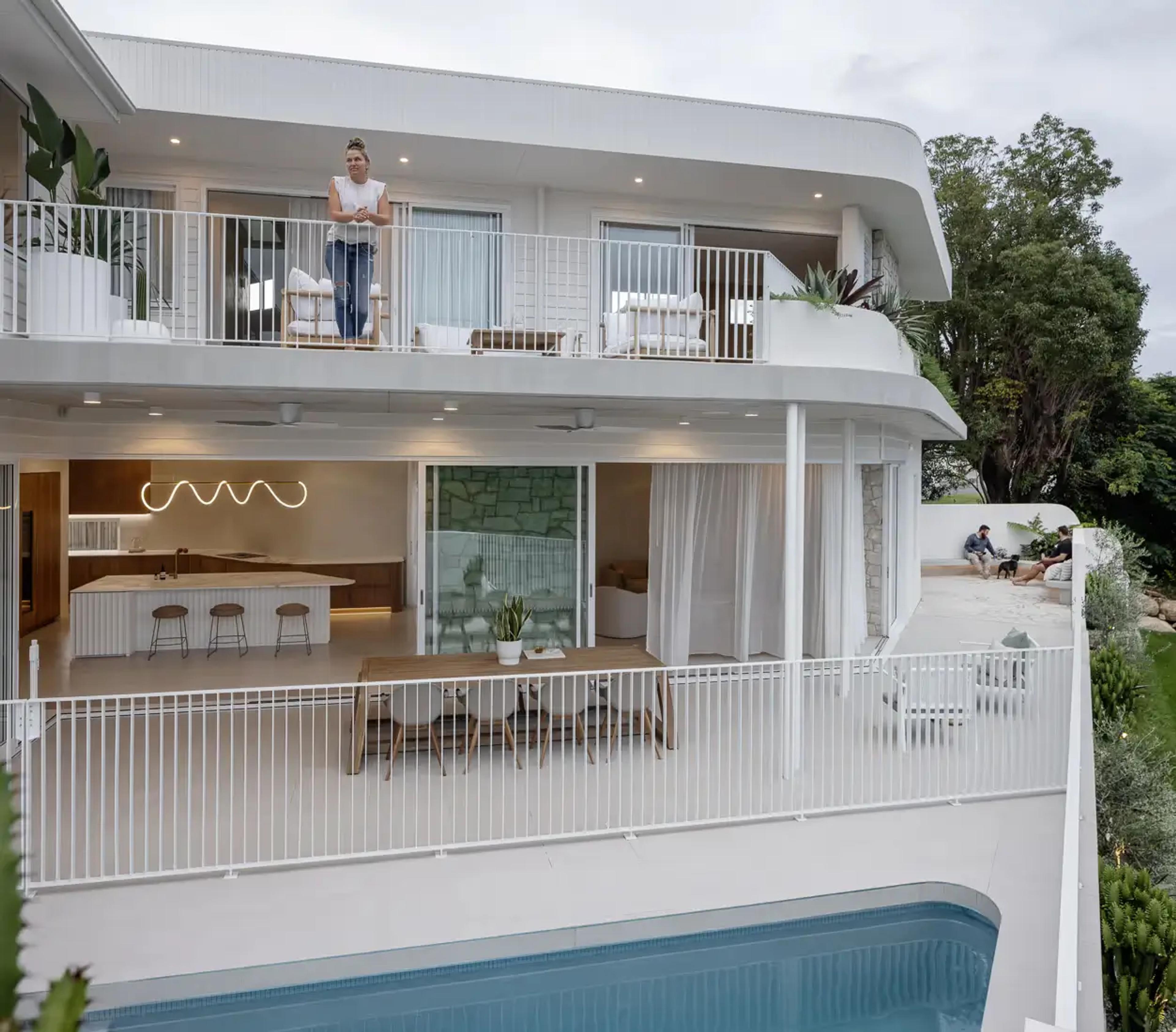 Layered architectural elevation on a steep sloping block design