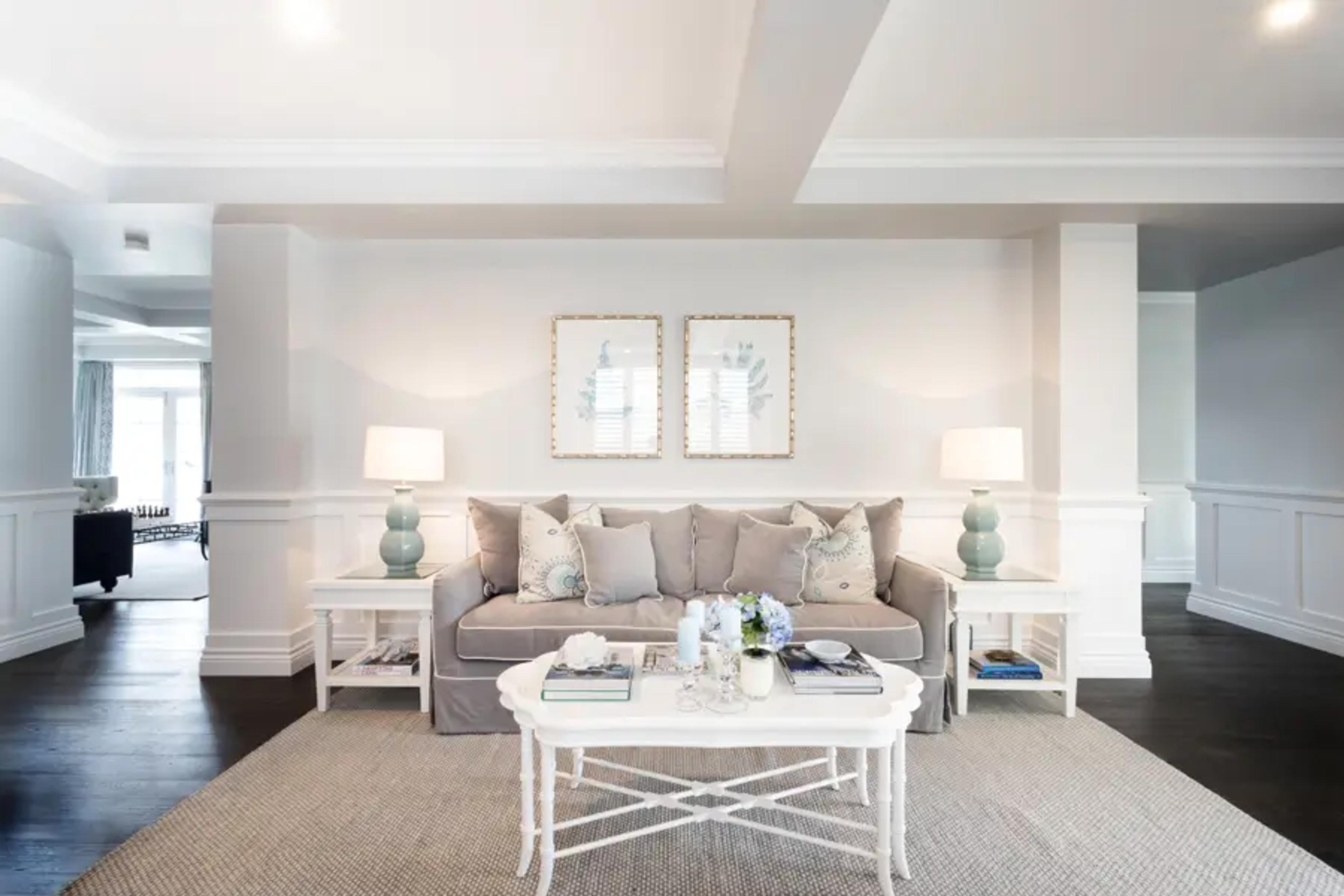 Neutral lounge room with linen sofa and matching lamps