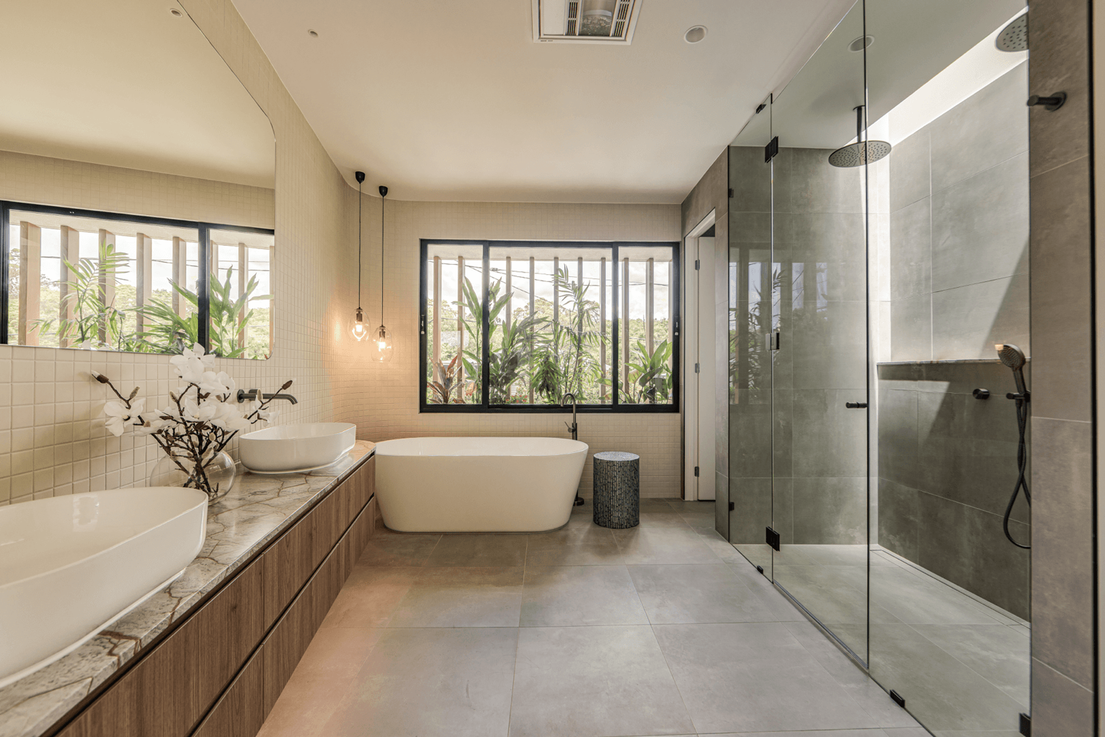 Ensuite with freestanding bath, twin basins and glass shower