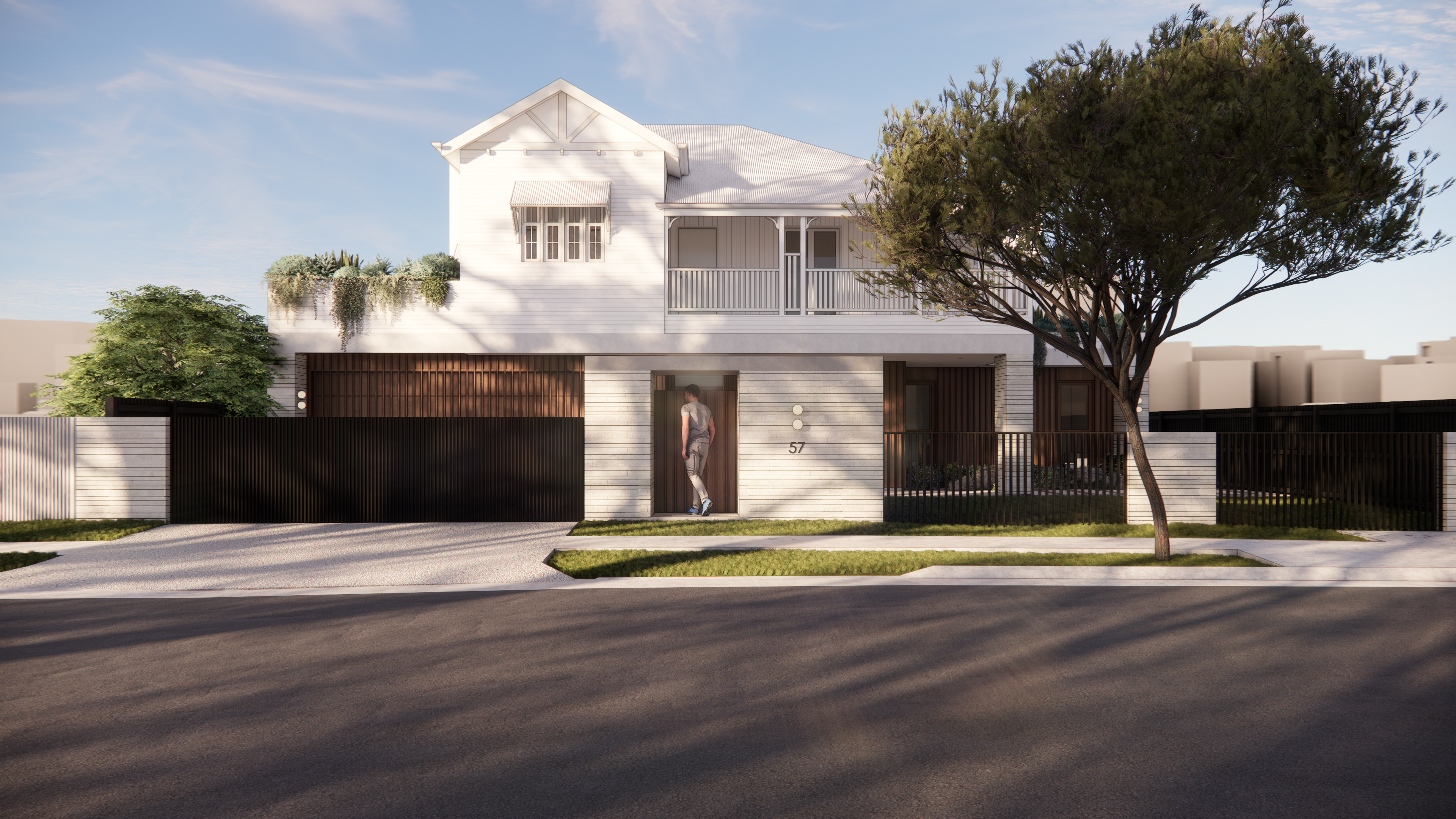Street facade of a white weatherboard two-storey home with gabled roof, timber garage and dark battened fence