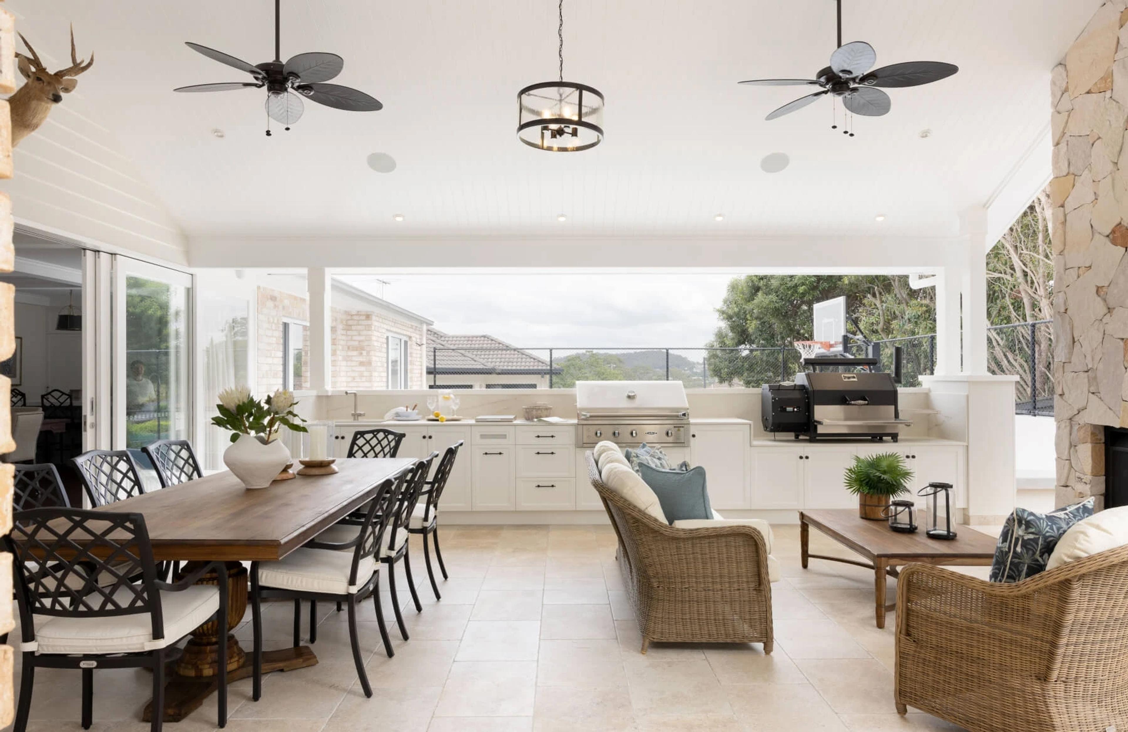 Alfresco lounge and dining space overlooking distant hills