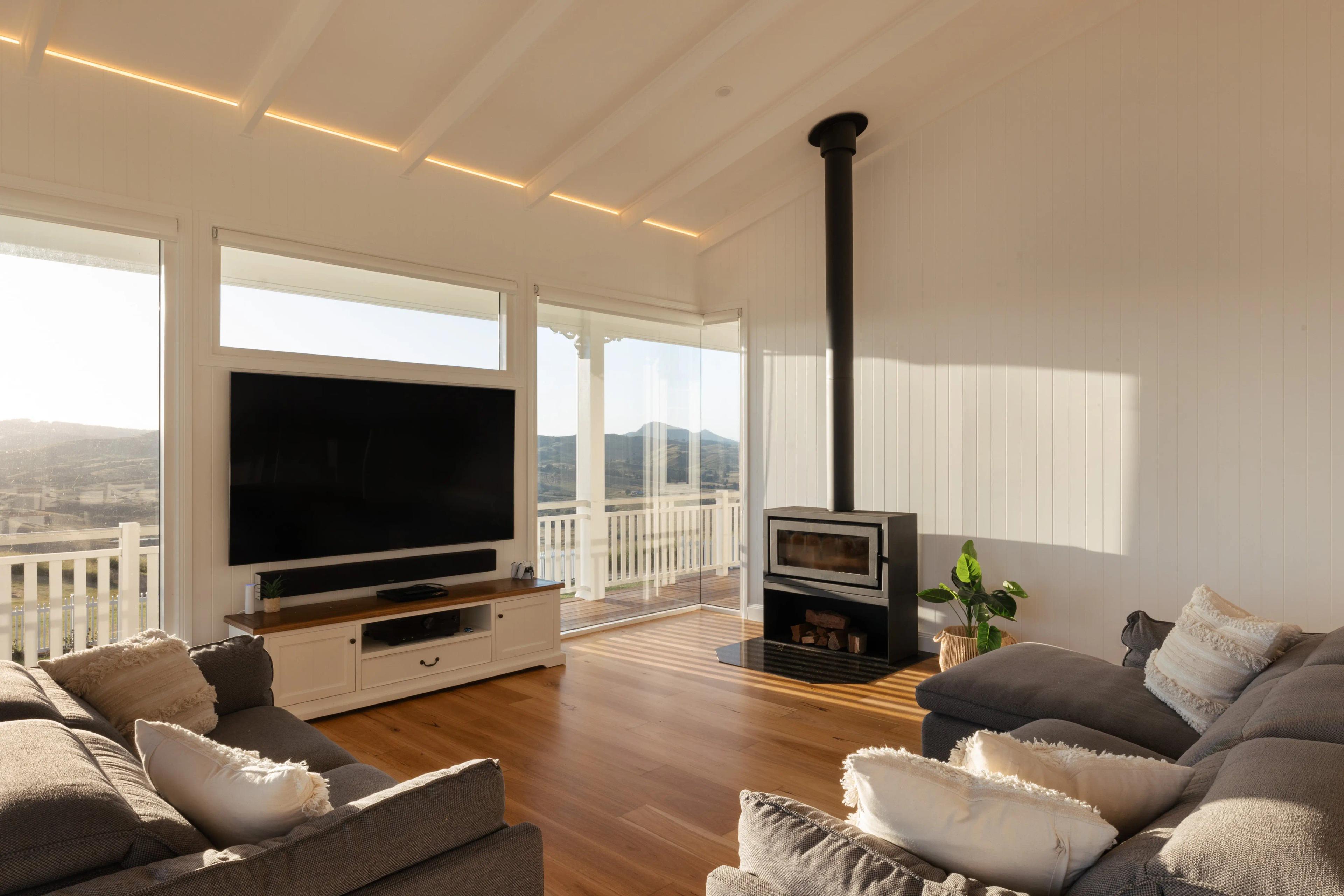 Modern living area showcasing sustainable house designs and passive solar performance