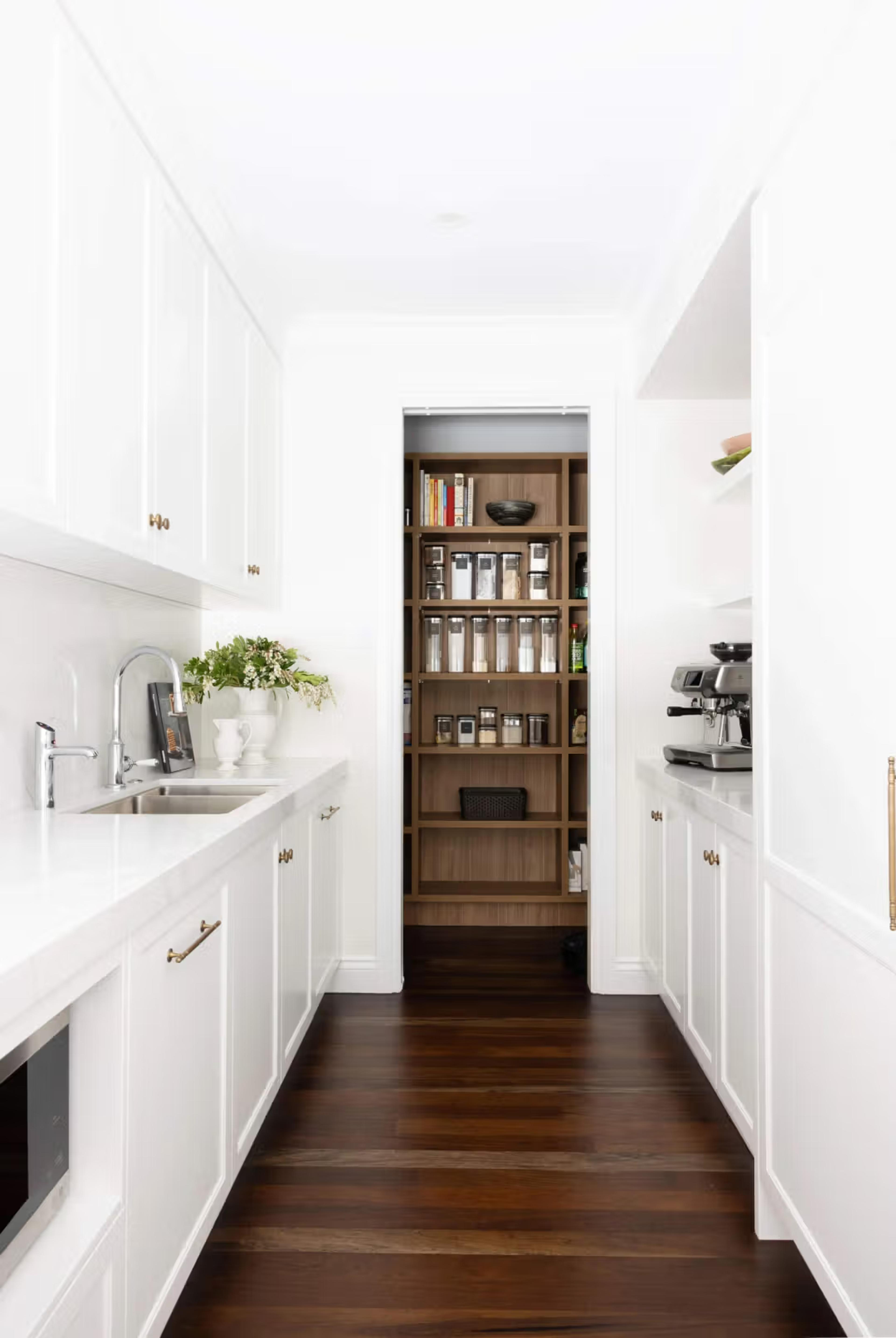 Multiple storage options within a butlers pantry designed by Invilla Architecture 